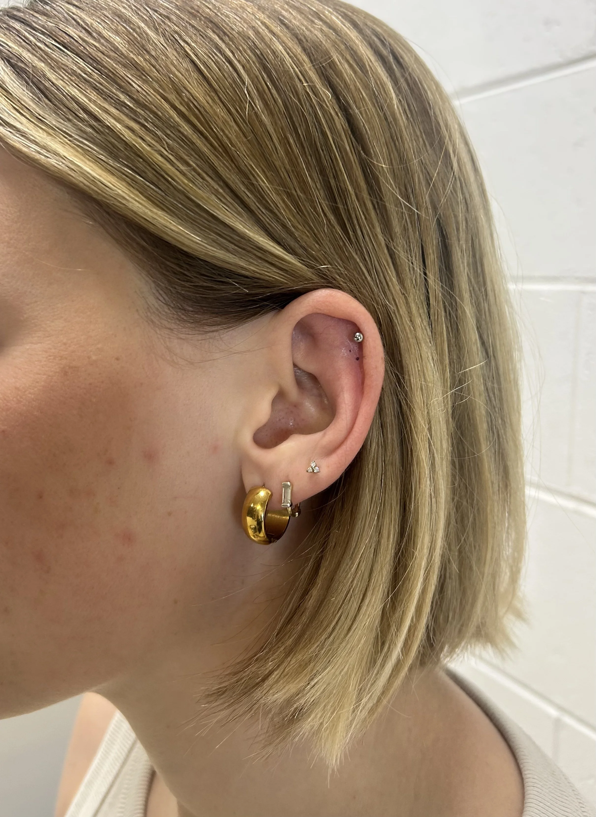Ear and Body piercing with Chantelle at Laser Luxe and Body Piercing in San Remo, on the Bass Coast