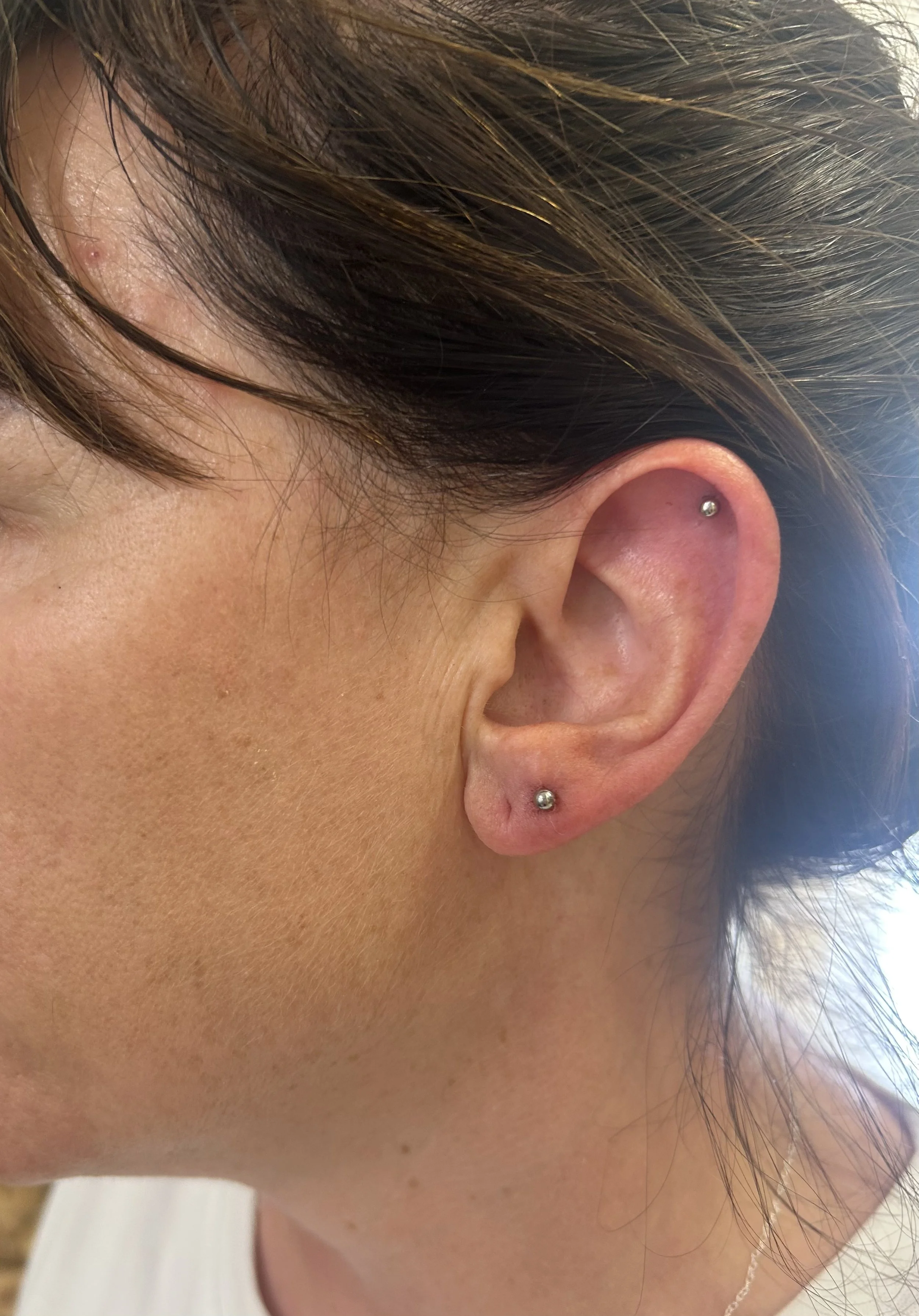 Ear and body piercing with Chantelle at Laser Luxe and Body Piercing in San Remo, on the Bass Coast