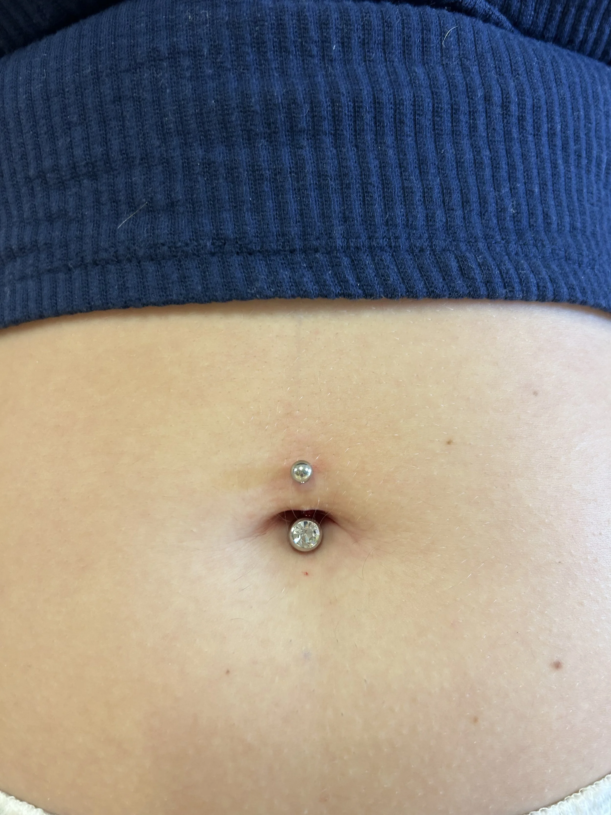 Navel body piercing by Chantelle at Laser Luxe and Body Piercing in San Remo, on the Bass Coast