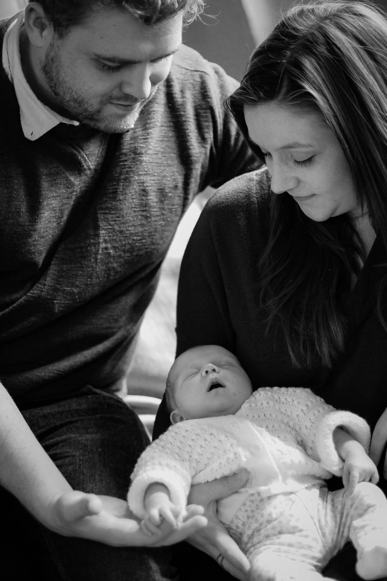 mother-father-smiling-at-baby-family-photography.jpg
