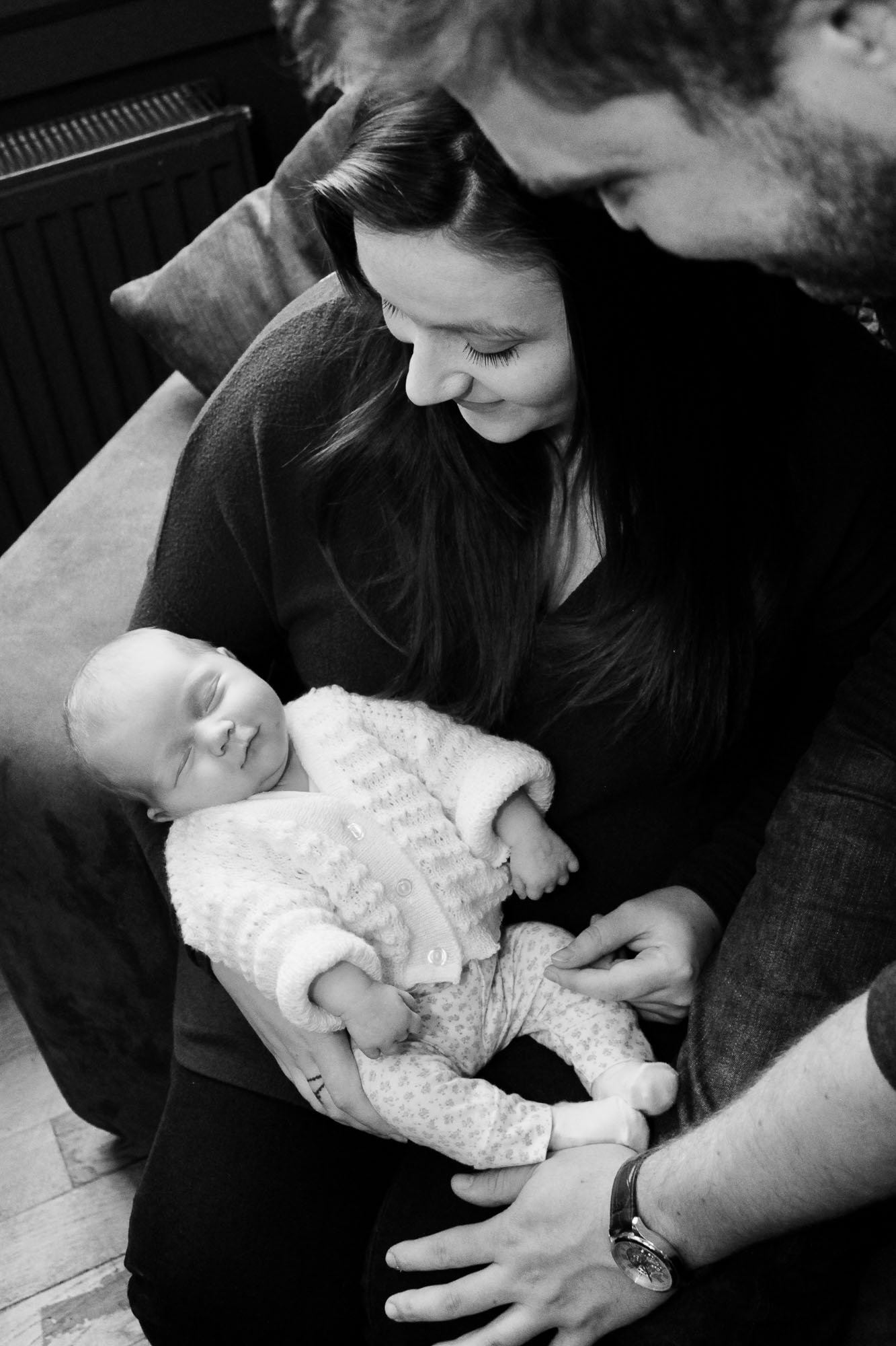 mother-cradles-newborn-photography.jpg