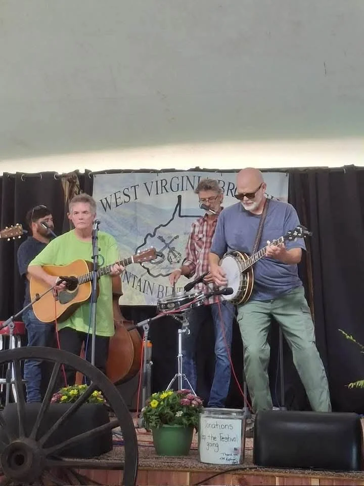 Bluegrass festival 2025 pic Mark and Sammy.jpg