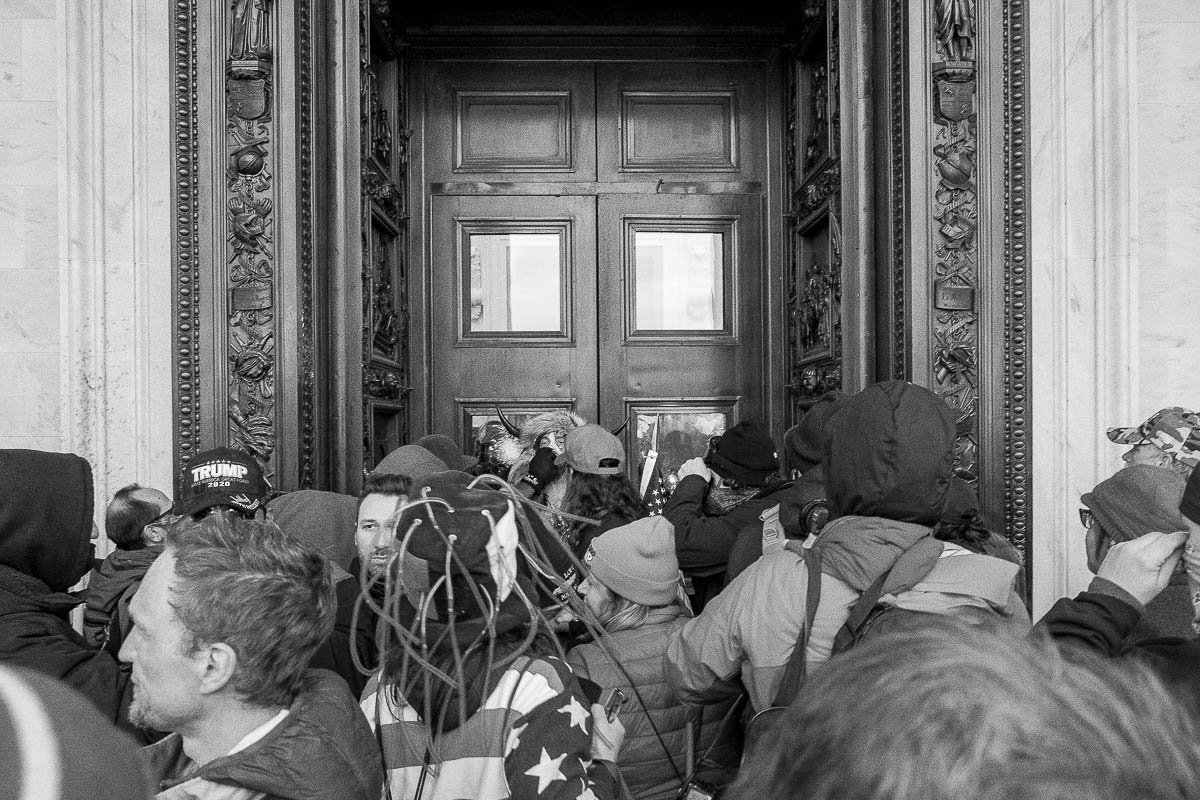 Demanding to be heard, a crowd rallies outside the west entrance of Capitol Hill. January 6, 2021, Washington, D.C.