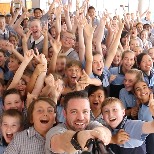 jonny shannon selfie with school students