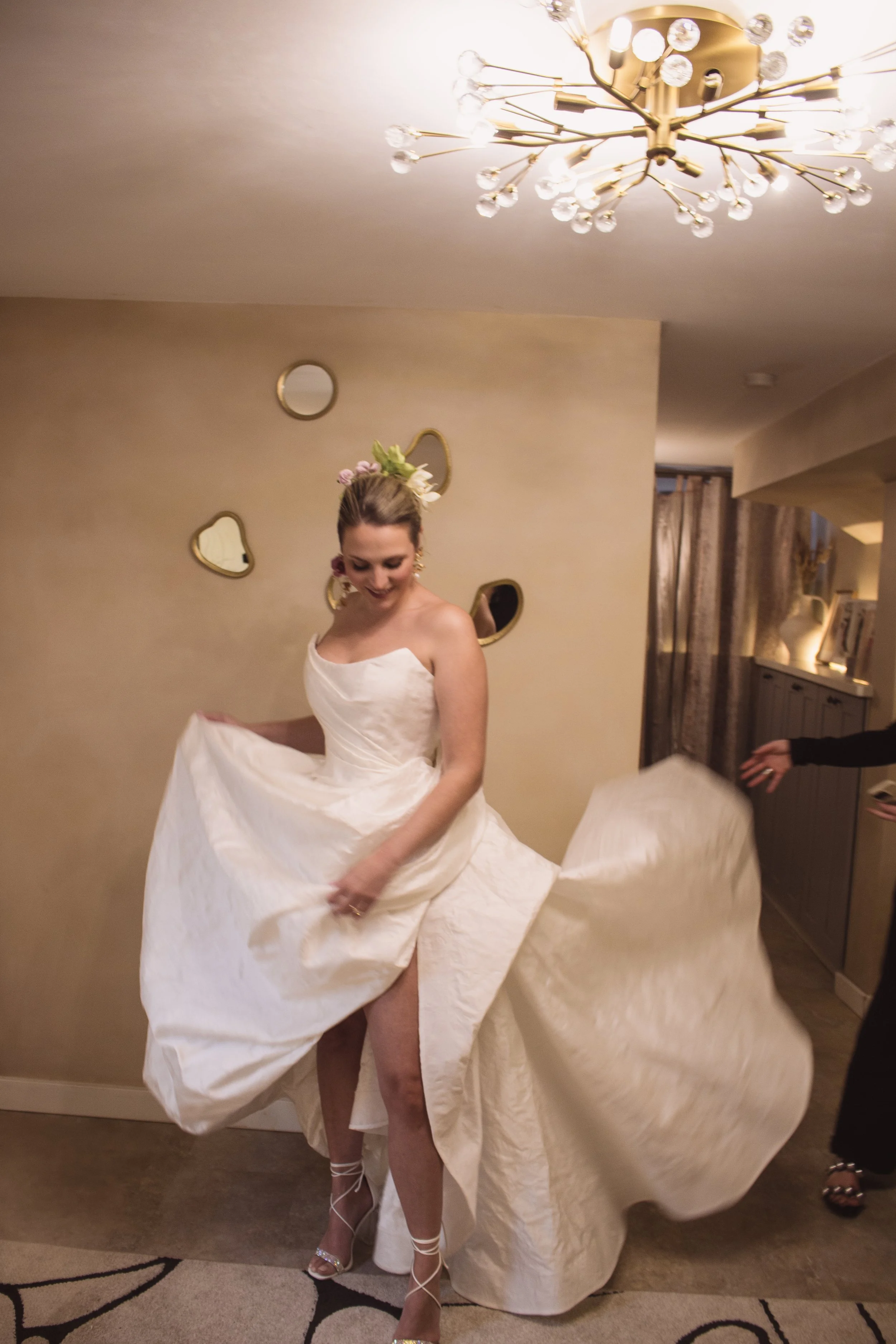 Custom made Italian jacquard strapless gown with asymmetrical draping and thigh high slit with rose draped bustle in back by Kirkland couture designer Angeline Brunk serving modern design driven women in the PNW and west coast specializing in fit.