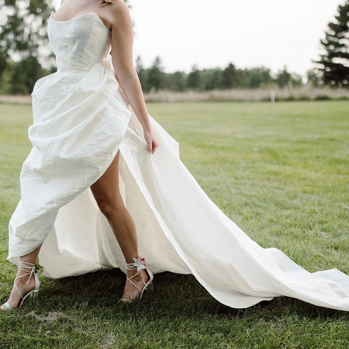 Calla lilly inspired sculpted couture gown with floor length fringe by Seattle designer Angeline Brunk for modern cool edgy chic sophisticated women looking for elevated designer fashion for their weddings and special events