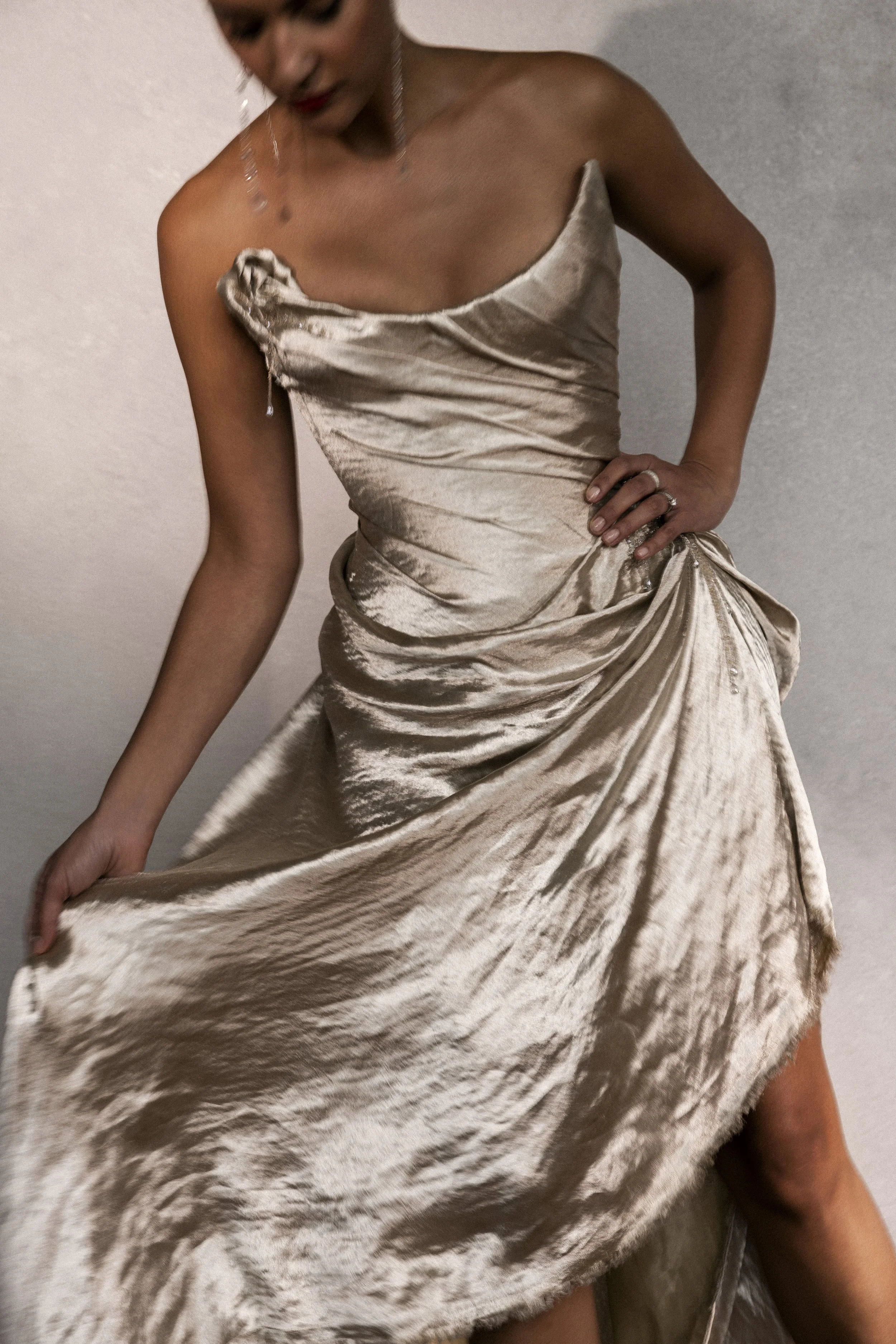 Calla lilly inspired sculpted couture gown with floor length fringe by Seattle designer Angeline Brunk for modern cool edgy chic sophisticated women looking for elevated designer fashion for their weddings and special events