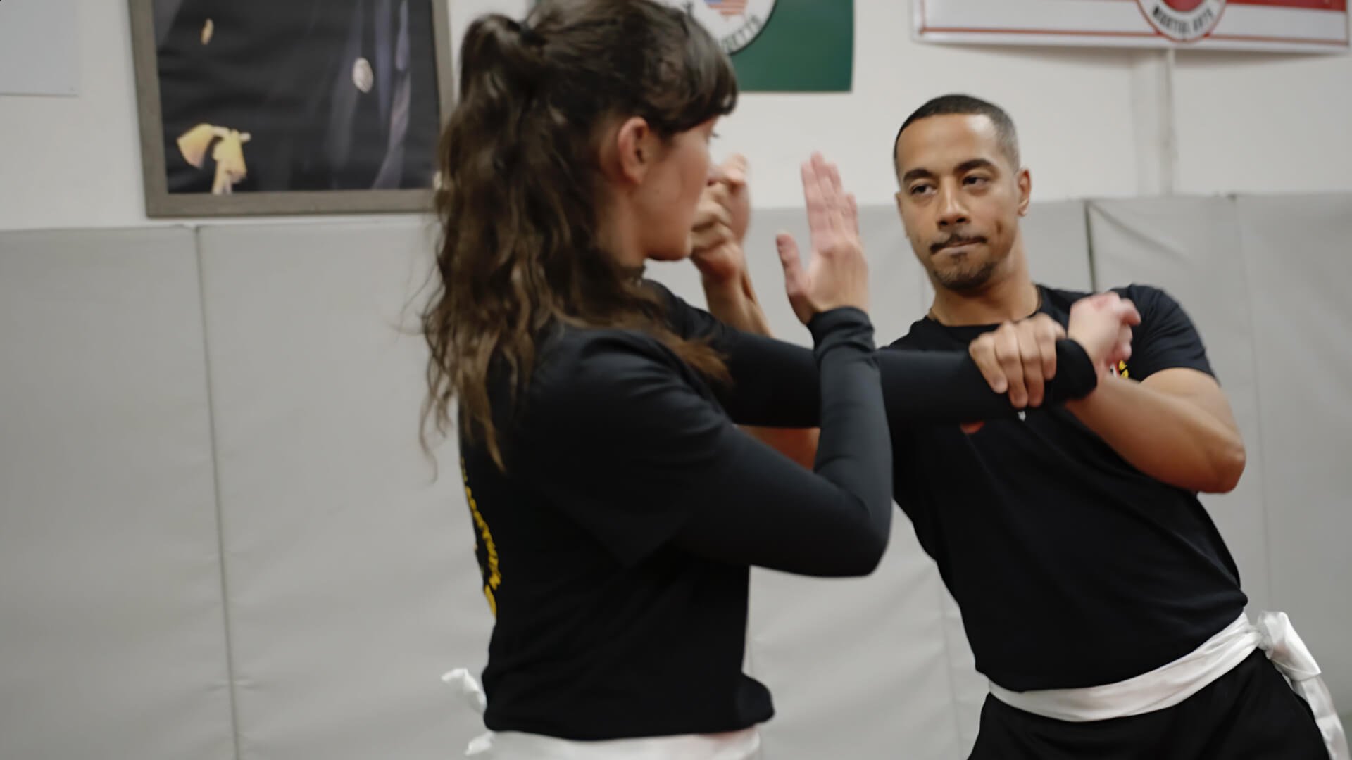 Two martial arts students practicing wing chun kung fu techniques
