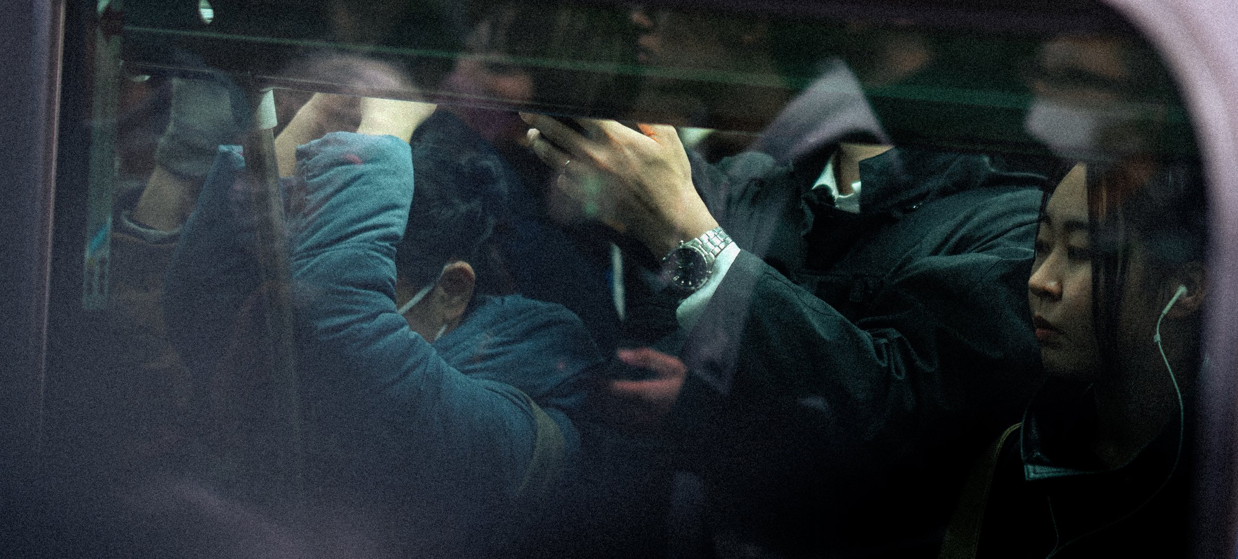 Bruce Wayne rides the metro.jpg