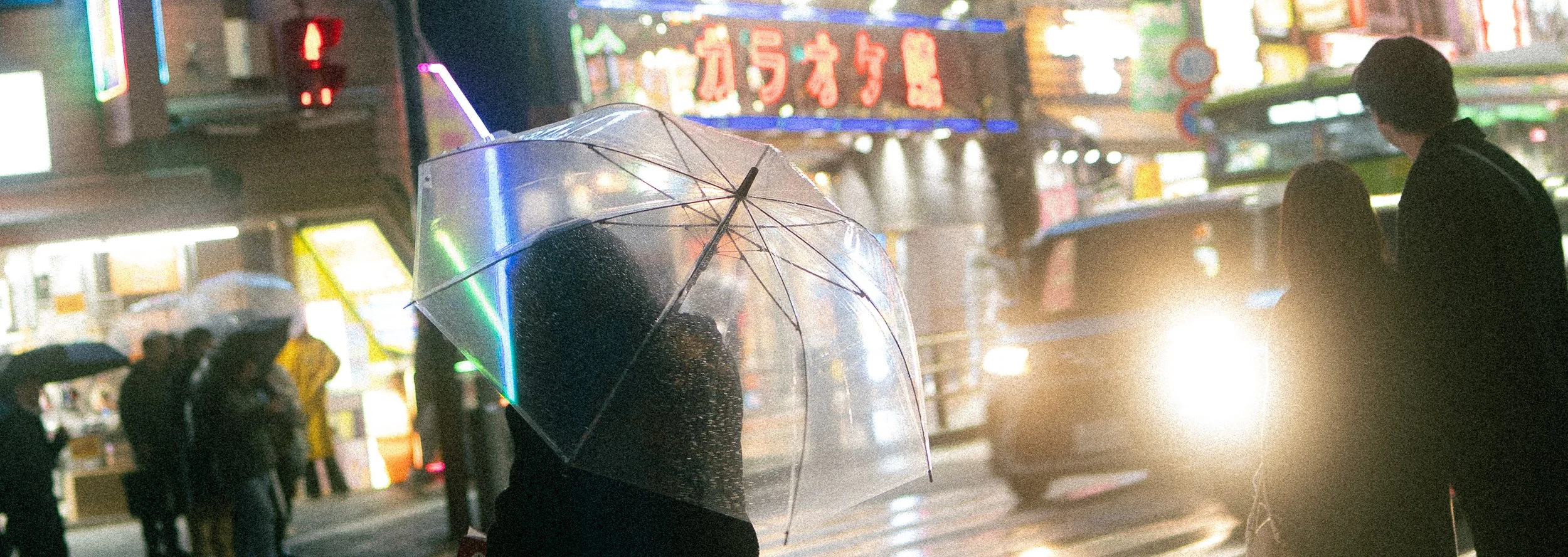 Waiting to cross the street in the rain.jpg