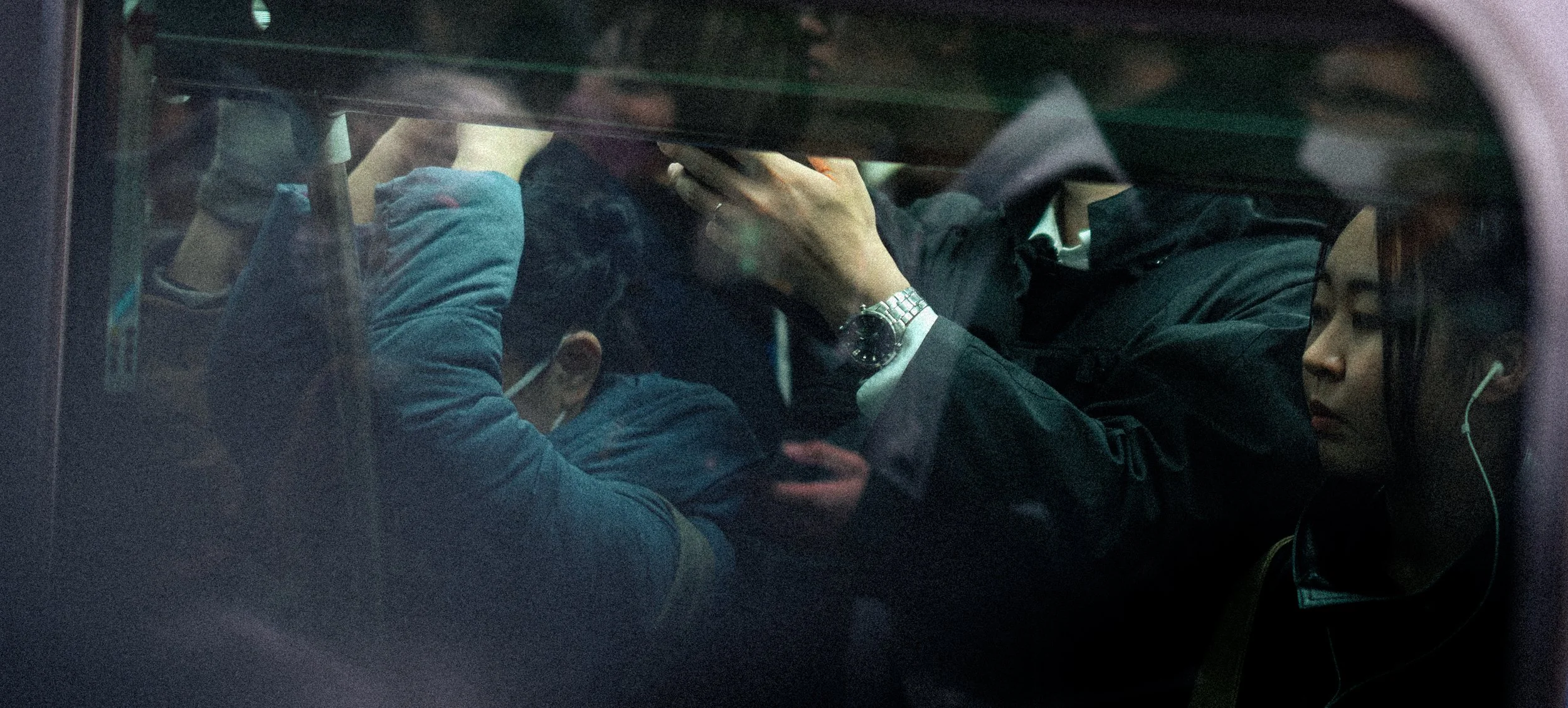 Bruce Wayne rides the metro.jpg