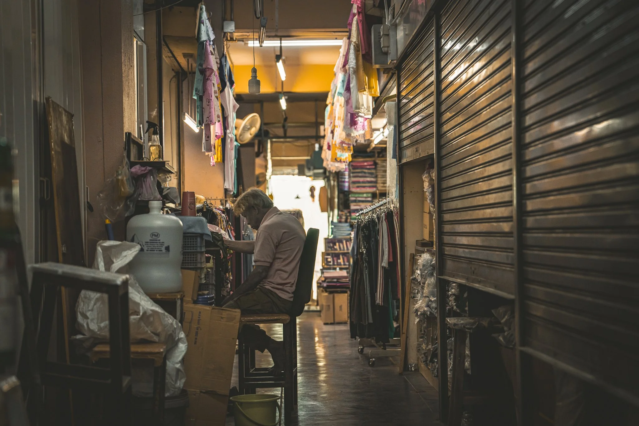 Chiang Mai - Worker in hallway.jpg