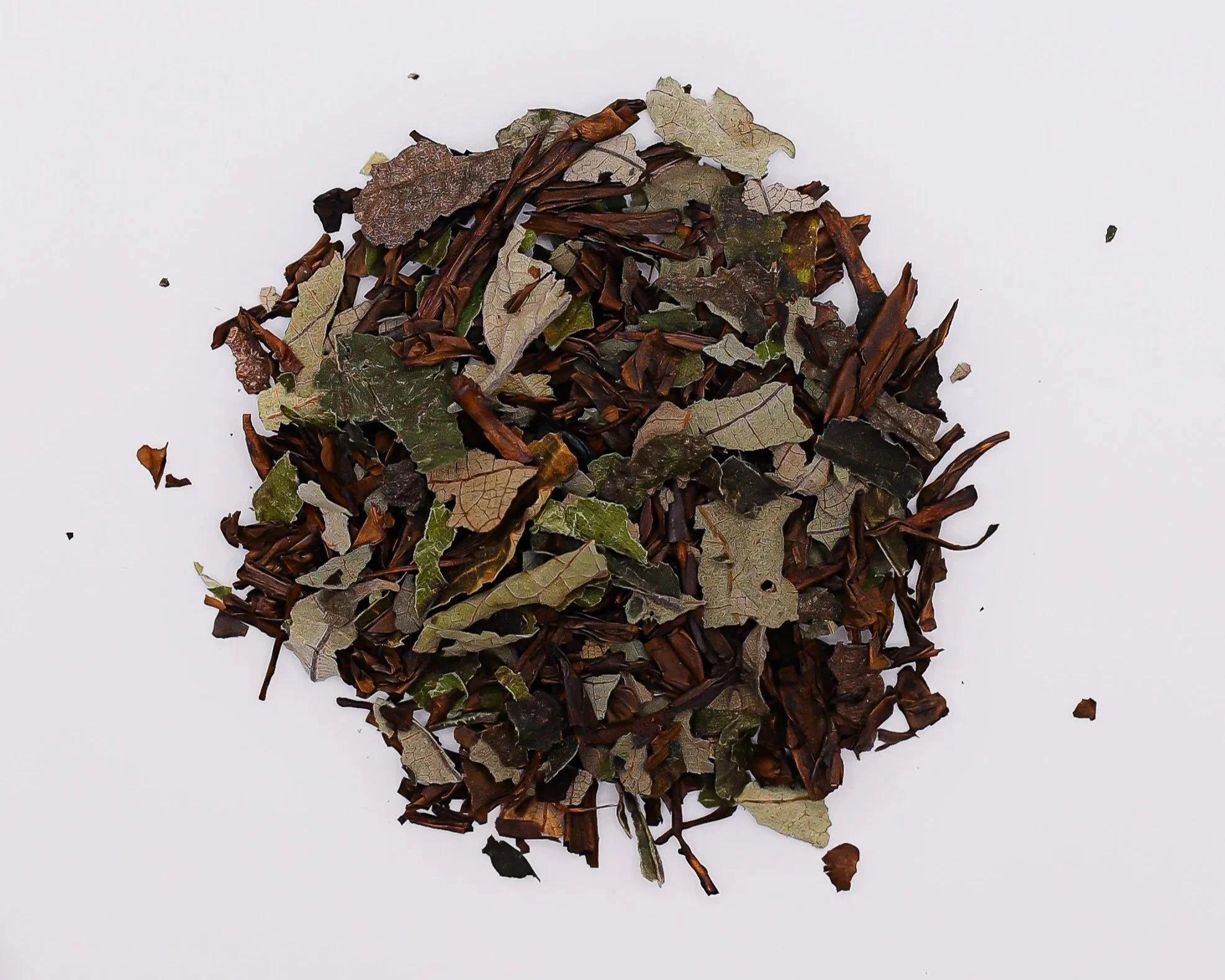 A pile of dried leaves and twigs on a white background.