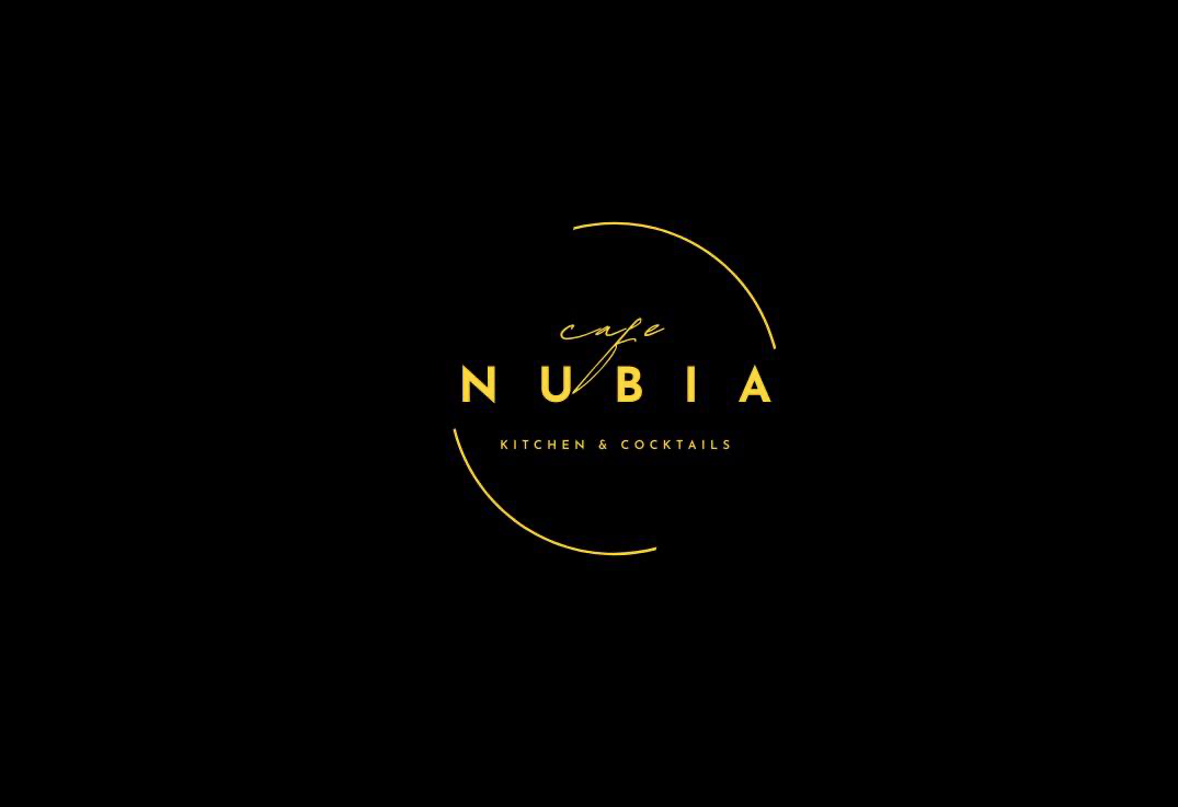 Logo for Cafe Nubia with yellow text on a black background, featuring a crescent shape and the words Kitchen & Cocktails.