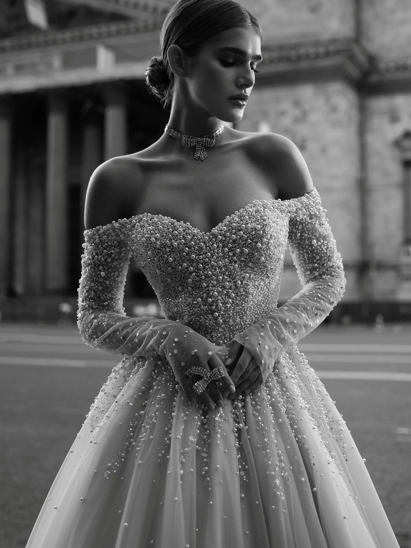 ✨ The Marile Wedding Gown ✨

A masterpiece of timeless elegance and regal charm.
With its flowing tulle skirt, pearl embroidery, and classic buttoned back, The Marile is designed to make every bride feel like royalty. Perfect for grand venues and unf