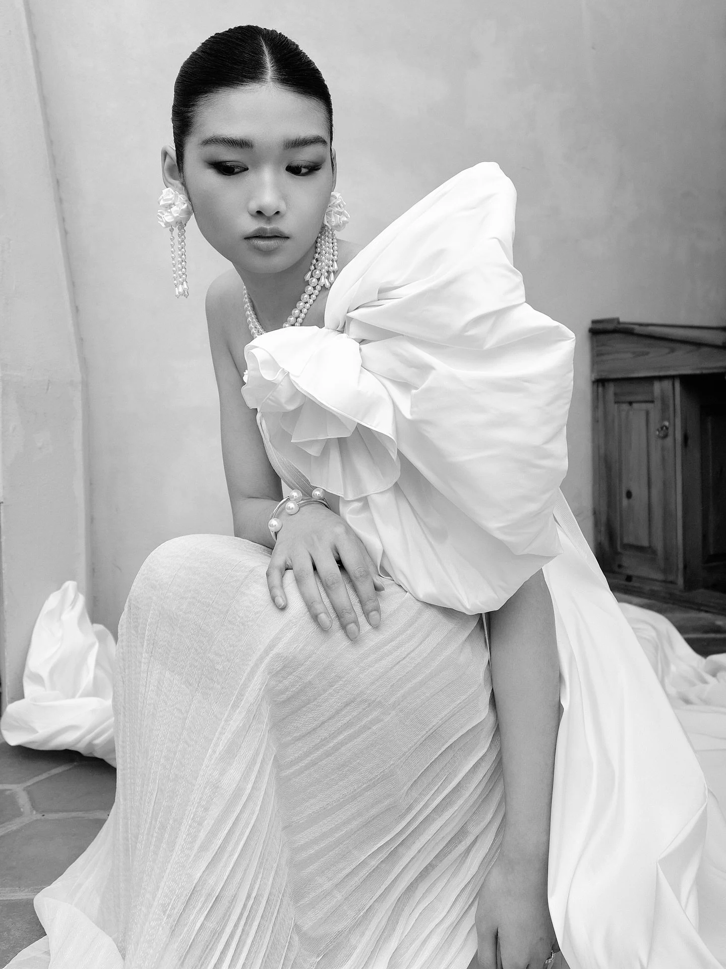 Introducing Perlamutr &mdash; our newest couture masterpiece ✨
A gown that blends modern artistry with effortless elegance.

Featuring a sculptural one-shoulder silhouette, soft pleated textures, and a dramatic draped train, Perlamutr is designed for