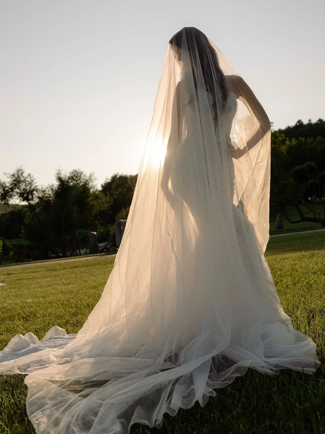 The Santina Gown by Ukrainian brand Yedyna is a luxurious, curve-hugging wedding dress that redefines bridal sophistication. 

Adorned with intricate beads and sequins in a dazzling one-of-a-kind pattern, this gown exudes glamour from every angle.

P