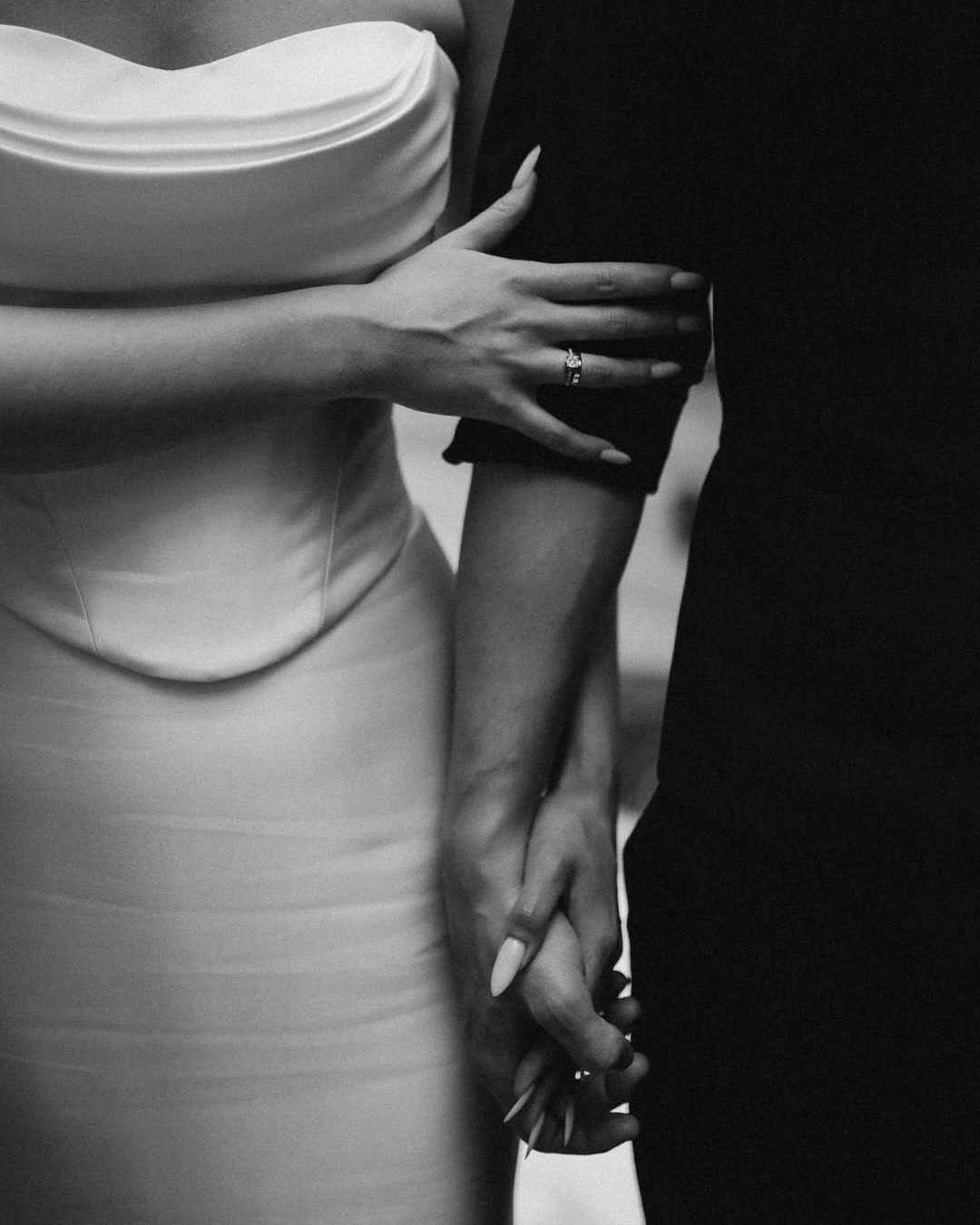 The Dorsey Wedding Gown: Modern Glamour with a Touch of Romance

Make a statement on your wedding day with The Dorsey, a stunning satin gown that combines elegance with bold modern details. Designed with a structured bodice, pearl-accent neckline, an