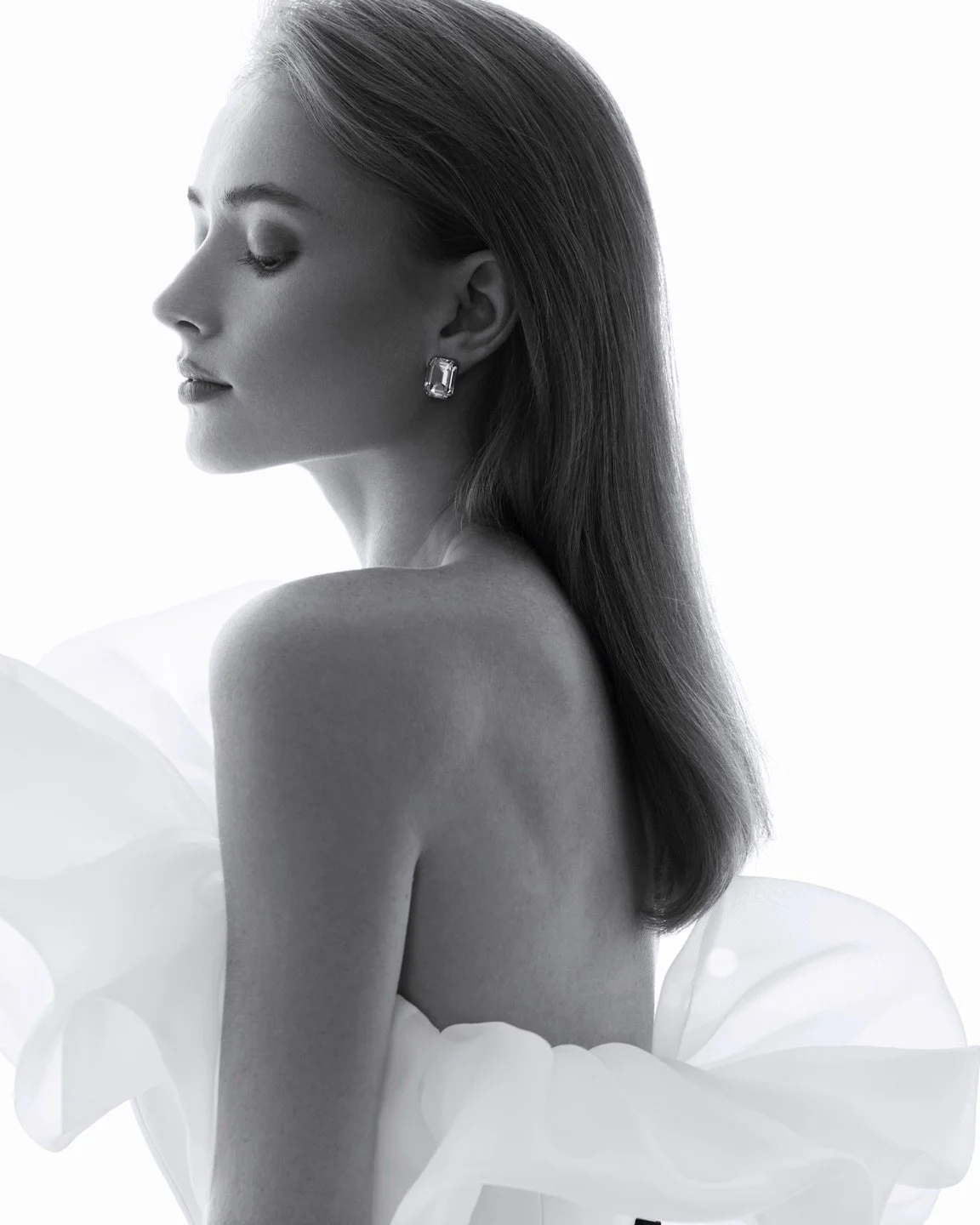 The Capileira Wedding Gown: Dramatic Elegance with Modern Flair

Step into the spotlight with the Capileira gown, a bold and artistic wedding dress made for brides who want to stand out. With its sculptural ruffled sleeves and sleek, figure-skimming 