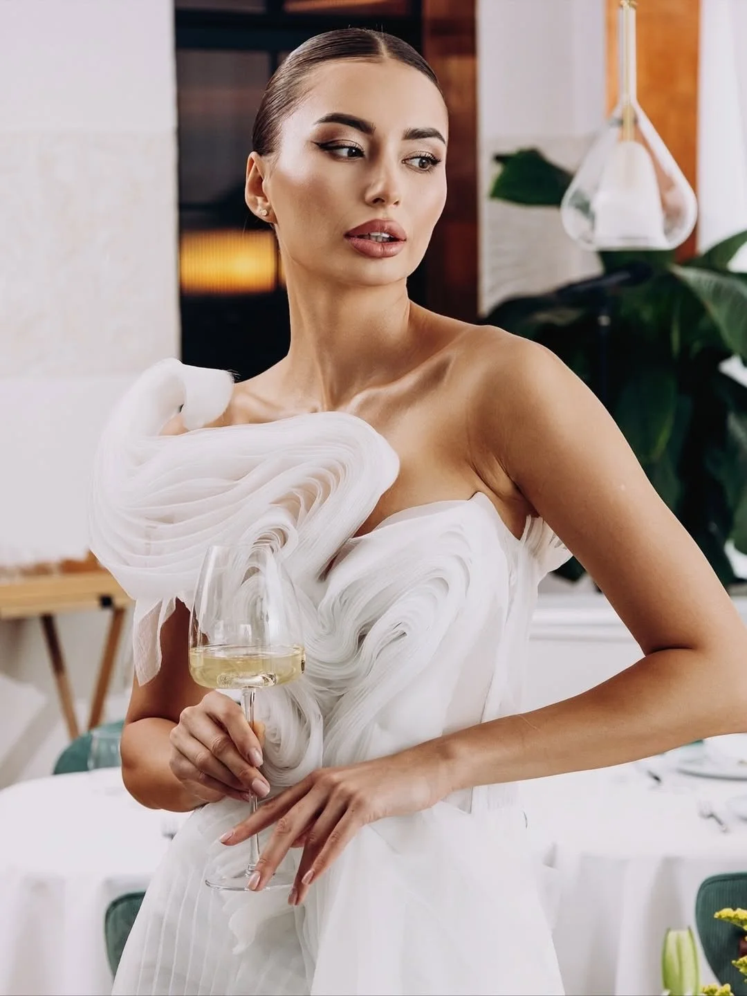 The Van Gogh dress by designer Lana Marinenko is a masterpiece brought to life.

Its dynamic, chaotic pattern channels the spirit and energy of the legendary artist.
Intricate appliqu&eacute;s and soft creamy tones create a light, ethereal vibe.
The 