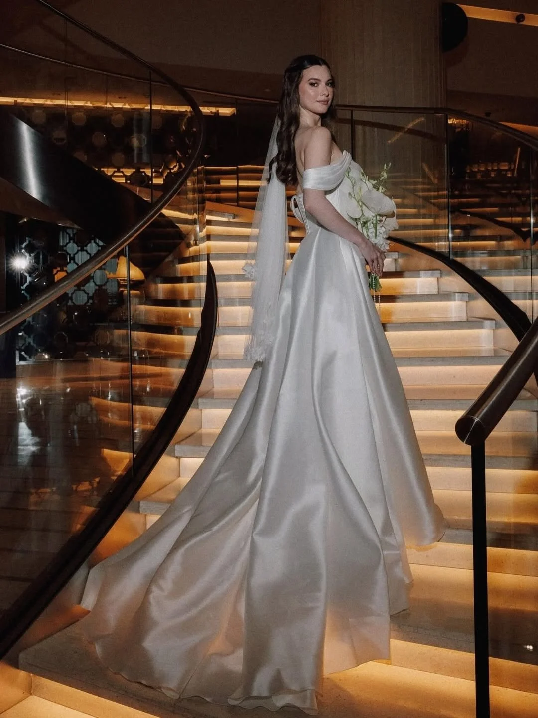 The Arha&ndash;Ottawa Gown: Modern Majesty in Sculpted Satin

A vision of contemporary sophistication, the Arha&ndash;Ottawa gown is designed for the bride who embodies confidence, grace, and effortless allure. Its architectural silhouette and lustro