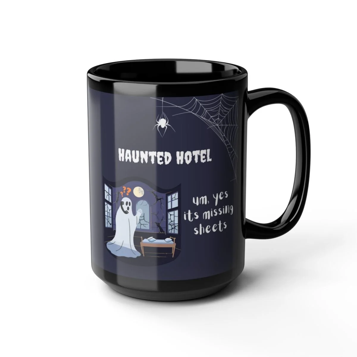 Haunted hotel coffee mug with ghost and spiderweb design.