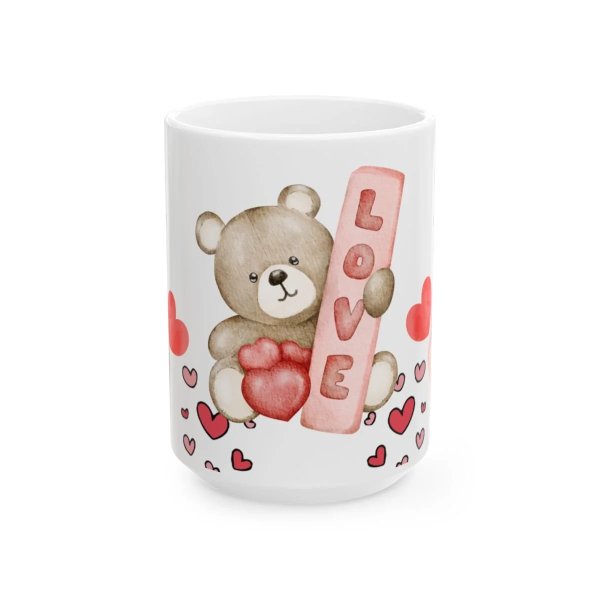 Ceramic mug featuring a teddy bear holding a pink "LOVE" block.