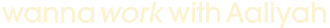 Text that says 'wanna work with Aaliyah' in bold, cream-colored letters on a black background.