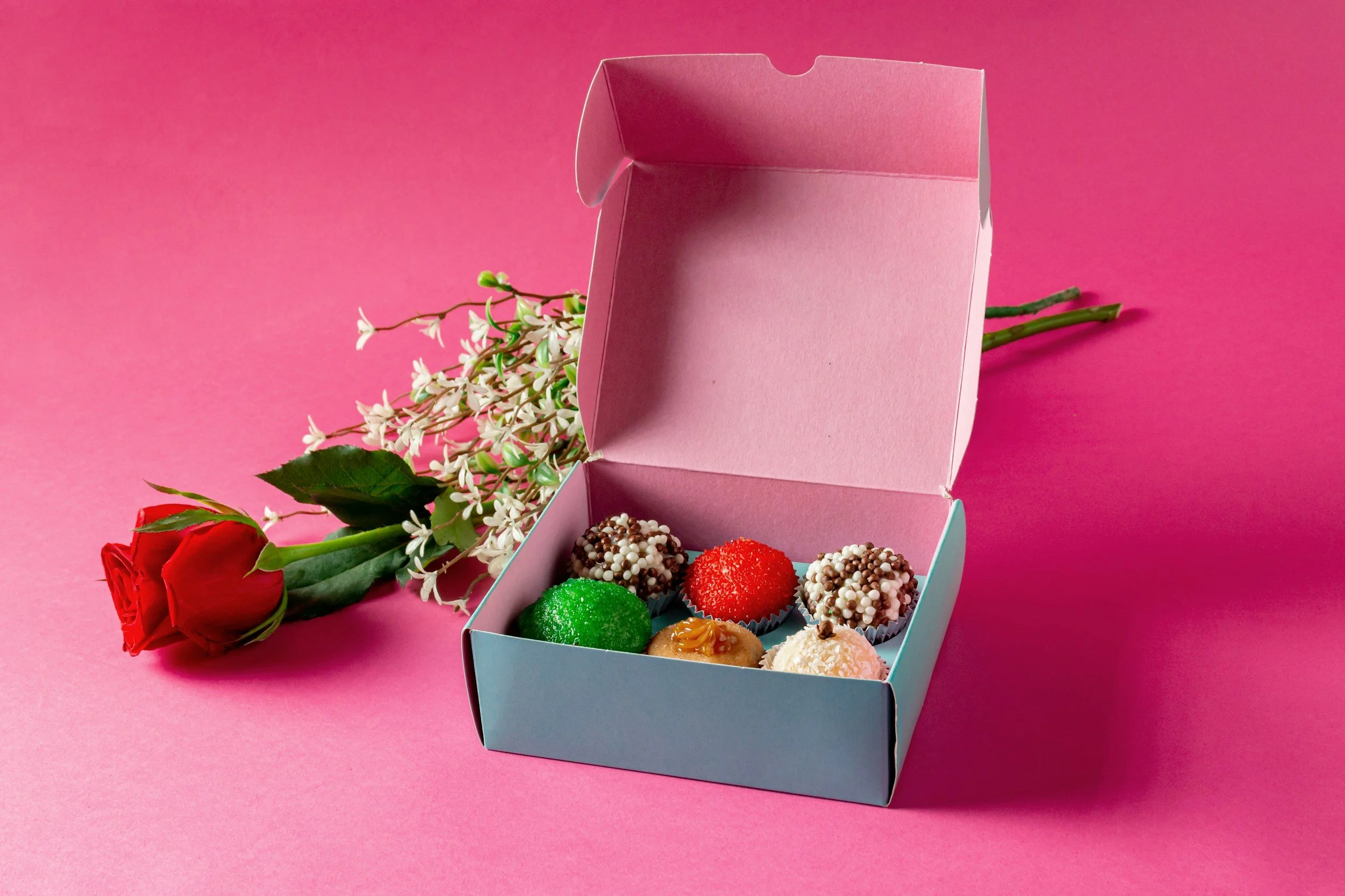 Box of cupcakes presented on a list of graduation gifts for her in Kansas City.