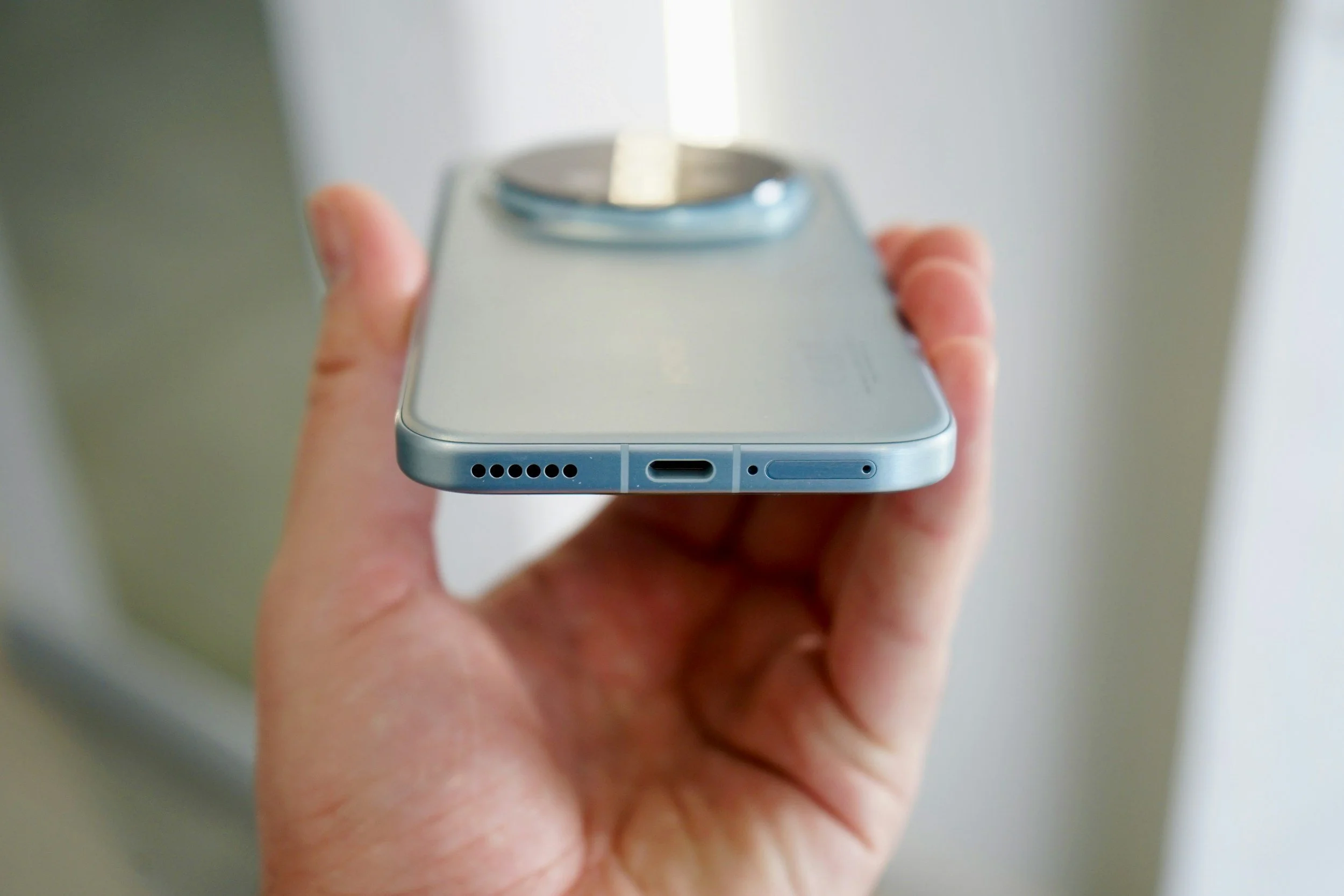 iPhone with a magnetic charger on the back representing the 'Useful Gifts for Girlfriend' featured in a blog called gift for girlfriend in Kansas City.