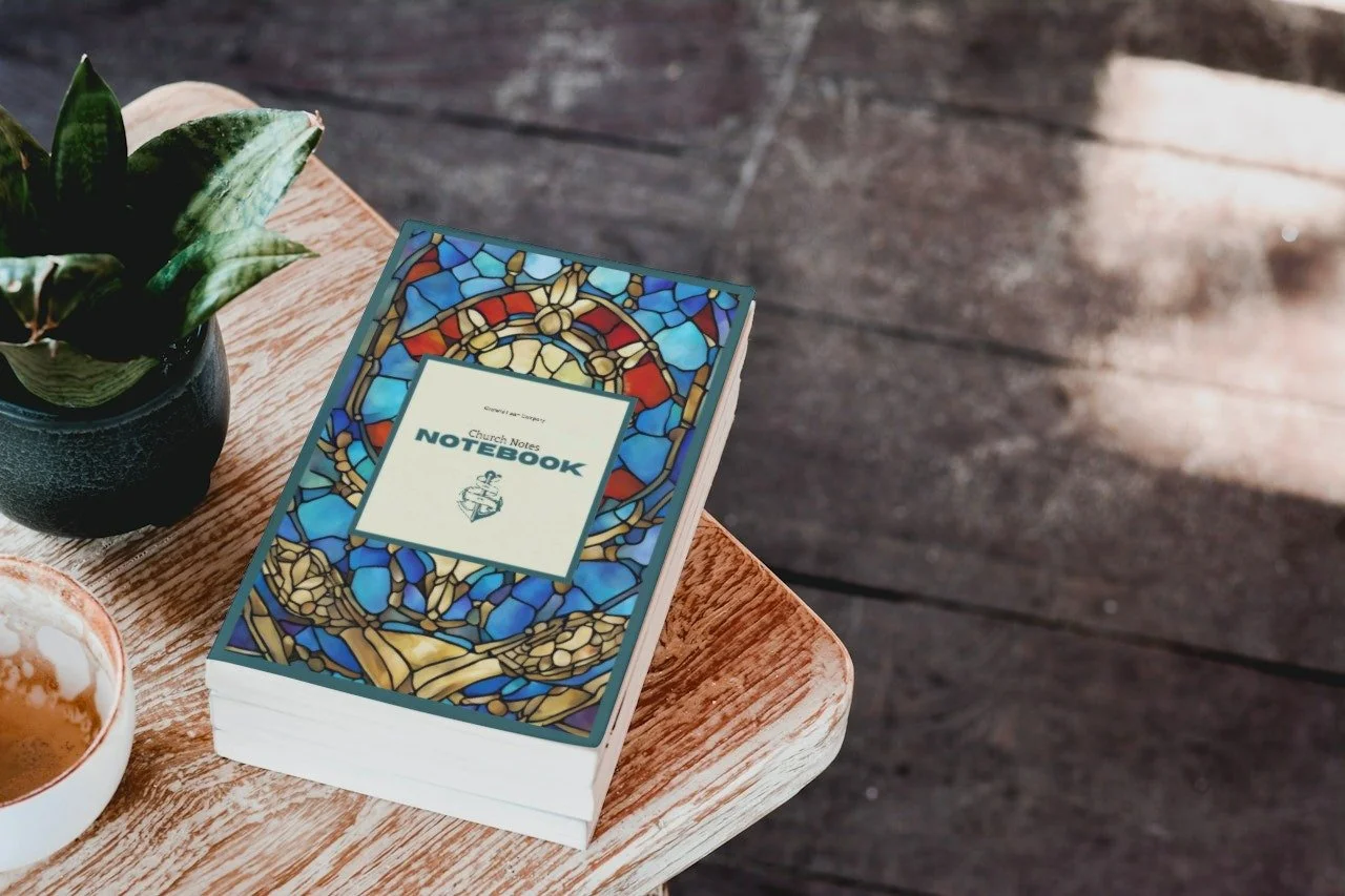 Church notes notebook on a wooden table featured on a product page for notebook for church notes