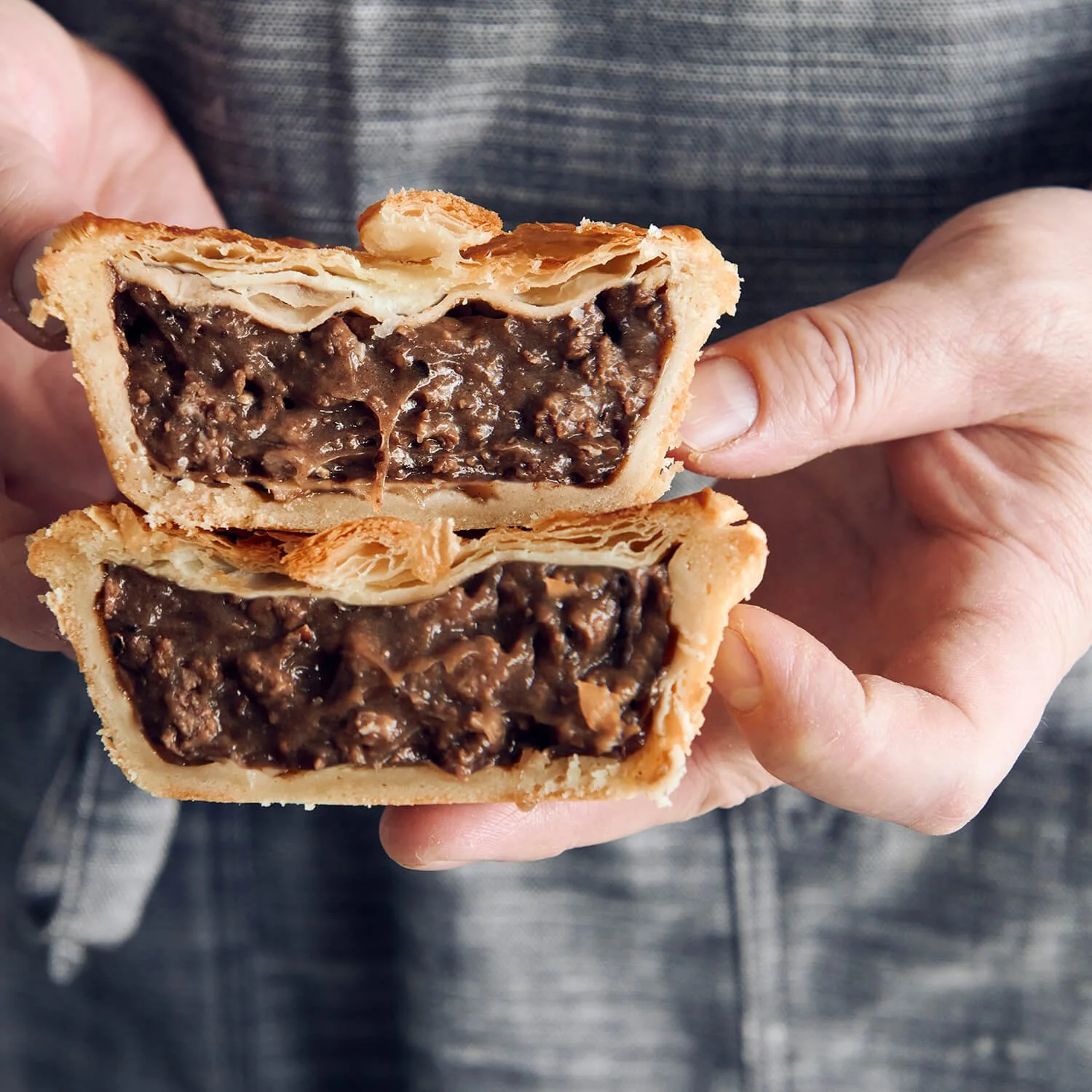 Pepper Steak Pie  with flaky puff pastry top, crusty base , and juicy meat filling.
