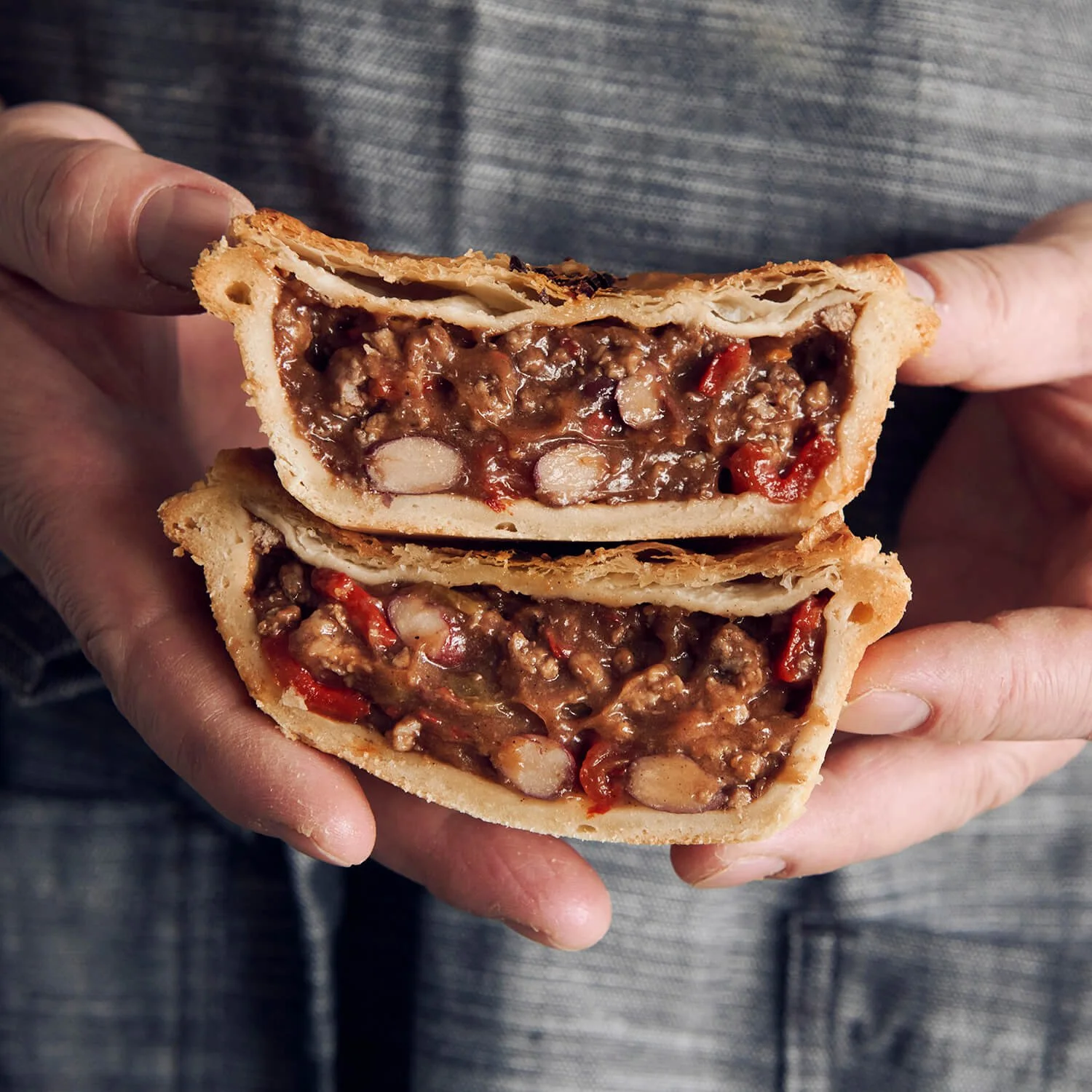 Chilli Steak Pie  with flaky puff pastry top, crusty base , and juicy meat filling.