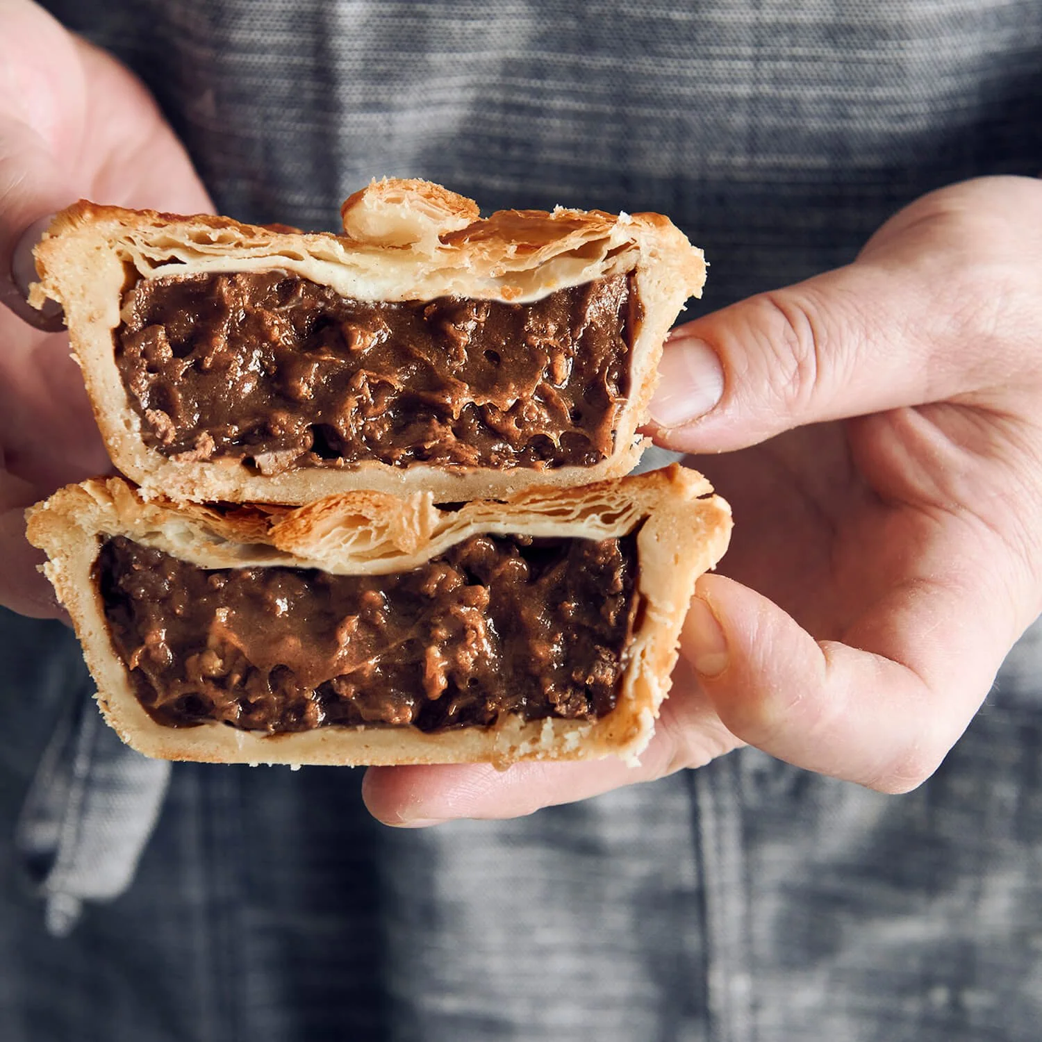 Curry Steak Pie with flaky puff pastry top, crusty base , and juicy meat filling.