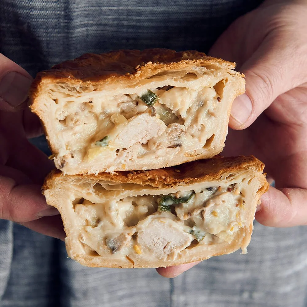Chicken Leek Mushroom pie  with flaky puff pastry top, crusty base , and juicy meat filling.