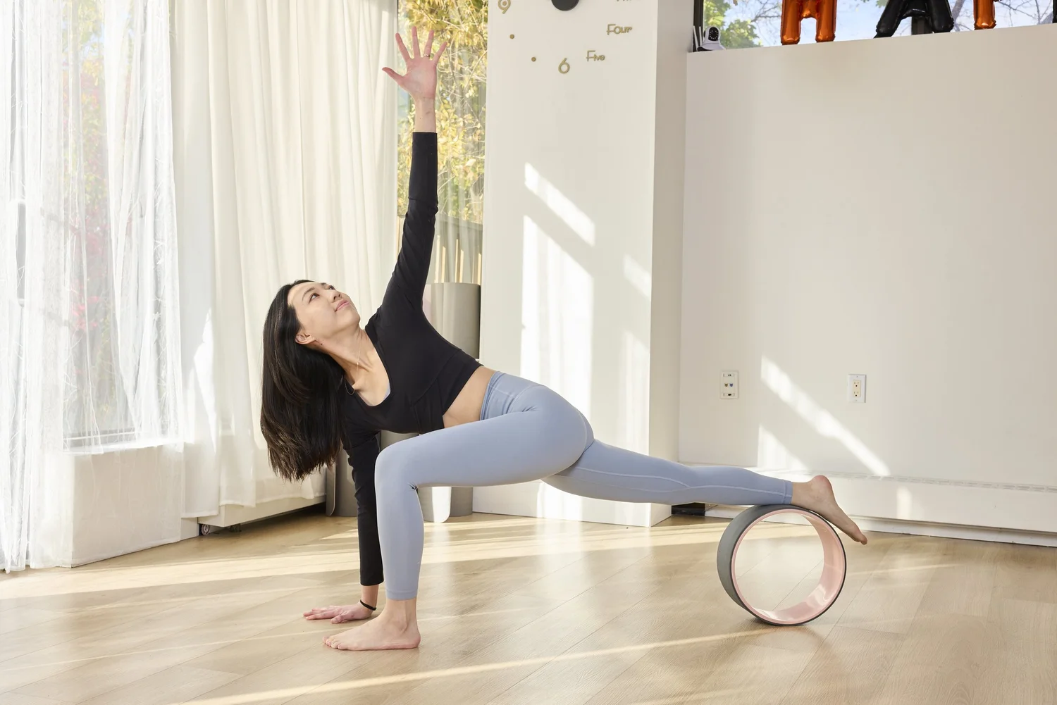Wheel yoga class at Aura
