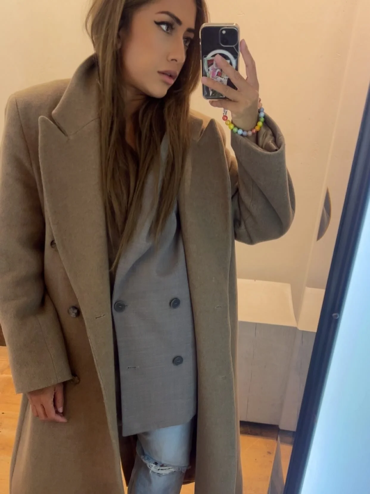 At least 3 layers is a must. I do love a jacket/blazer under a coat. 
Double breasted 
Ripped jeans 
Vejas