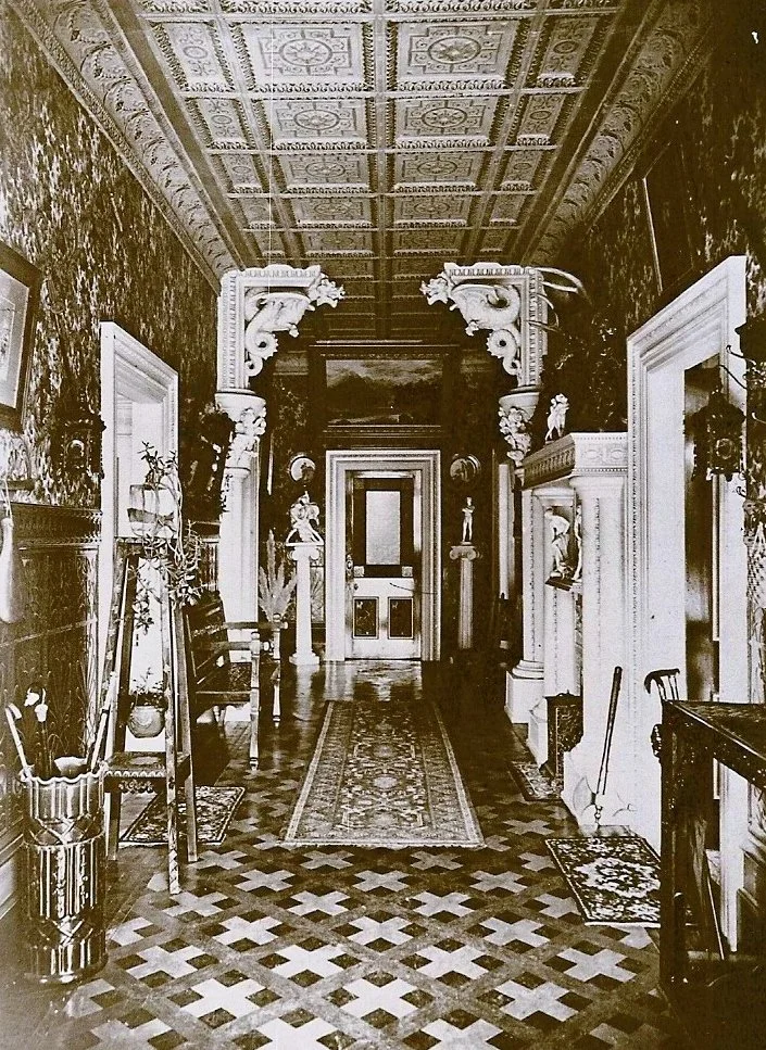Front hall ~ the dragons originated from Sloans Theatre.