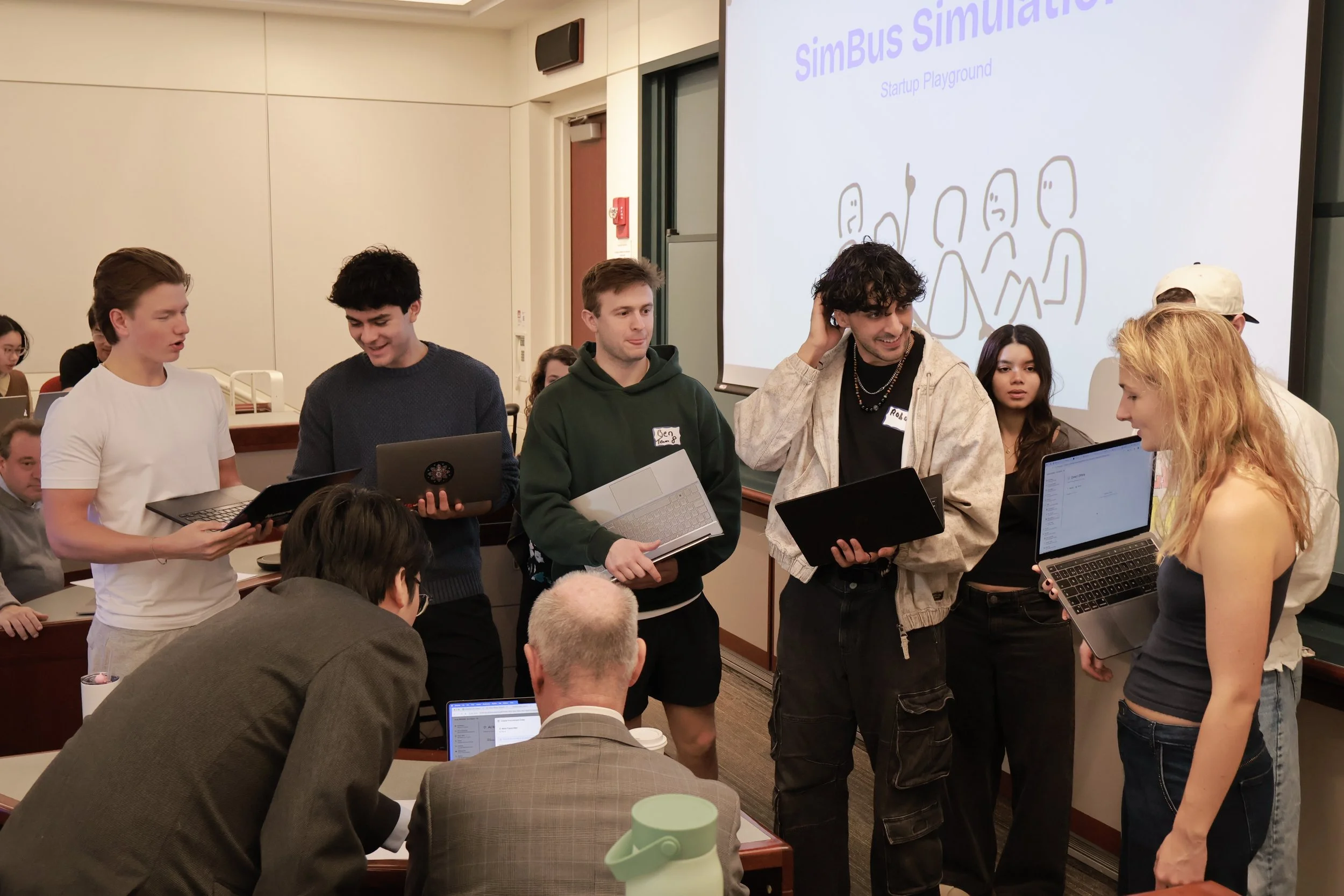 Boston University students pitching to their professor during a live SimBus in-class experiential learning simulation.