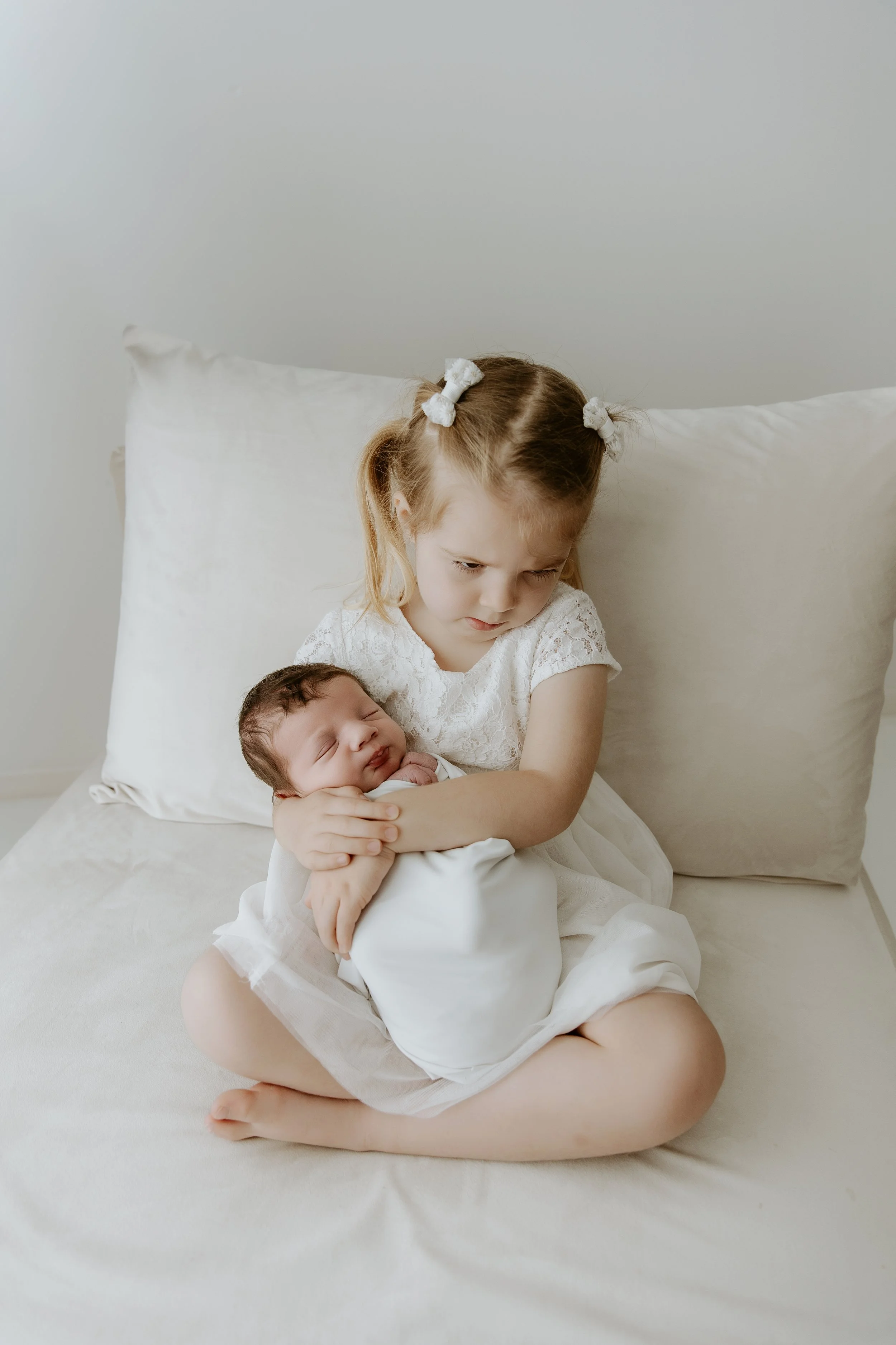 Newborn Photography With Siblings: They Don't Have to Be Perfect