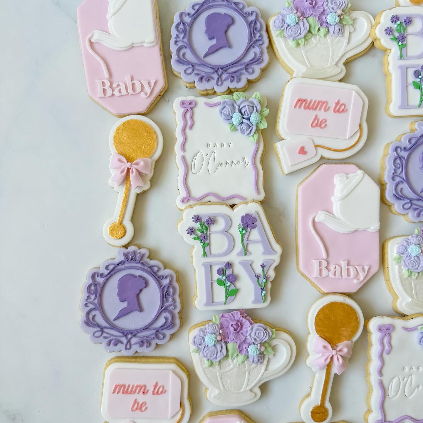 Little Lady O&rsquo;Connor is on the way 🫖💐
.
.
.
.
.
#NICSbics #fondantsugarcookies #nqcookies #personalisedcookies #cookiestownsville  #sugarcookies #customcookies #cookiesofinstagram #bridgertoncookies #babyshowercookies