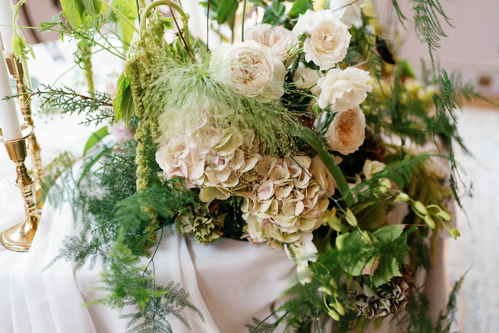 close up of hydrangeas roses and grasses at Hotham Hall Estate