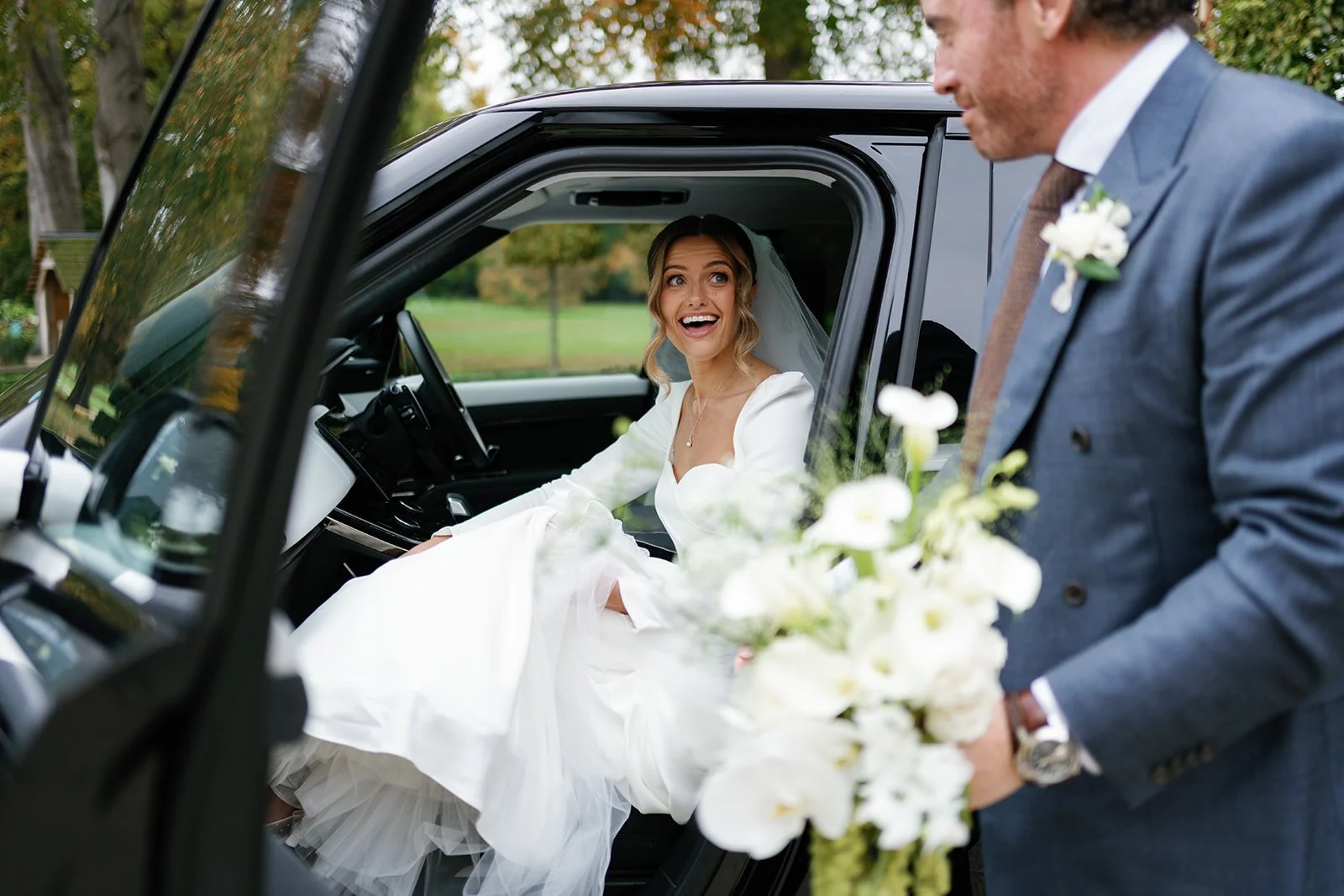 Bride in car arriving at Hotham Hall Estate
