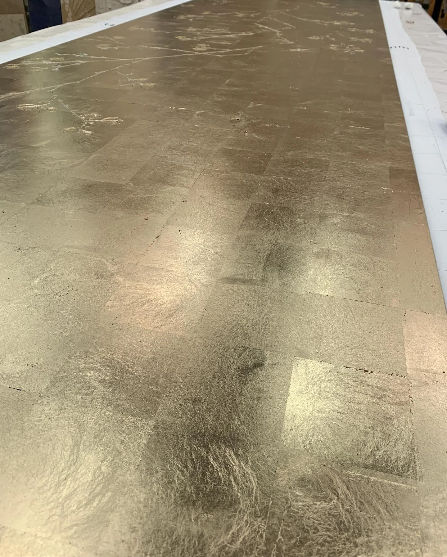 Getting the timing right for when to start gilding after applying size (the glue) is critical, as there is window of opportunity to apply the gold as it dries. If you try to cover a large area and leave it too late, you&rsquo;re screwed! Applying gol