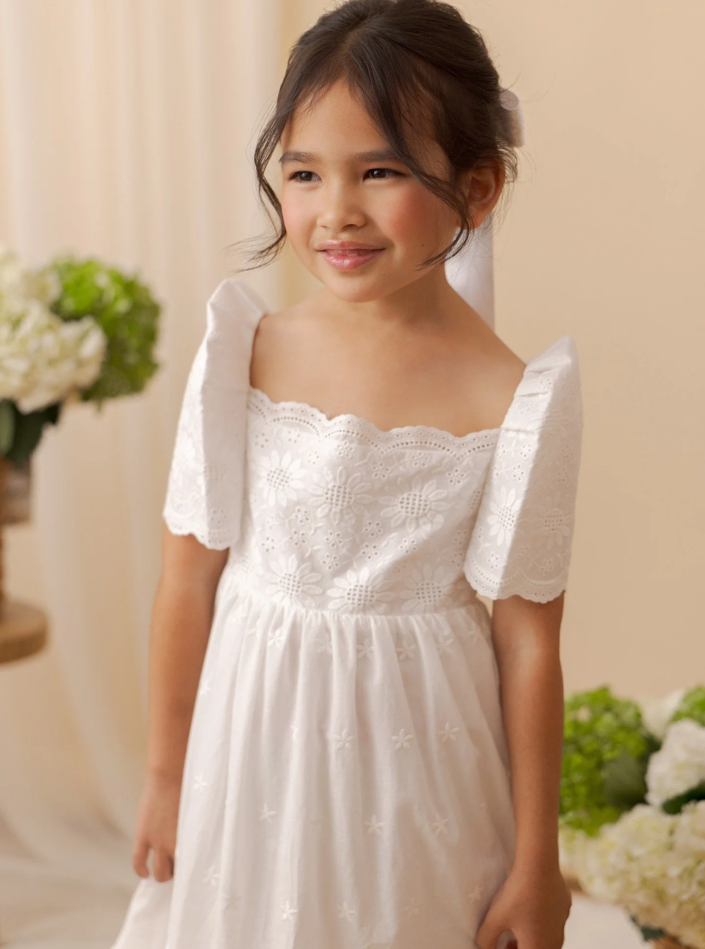 Little Lamb '26 is a collection designed to celebrate those most meaningful moments in your daughter's life that mark a milestone in her faith journey. The name "little lamb" comes from the book of Mark, where Jesus brings the daughter of J