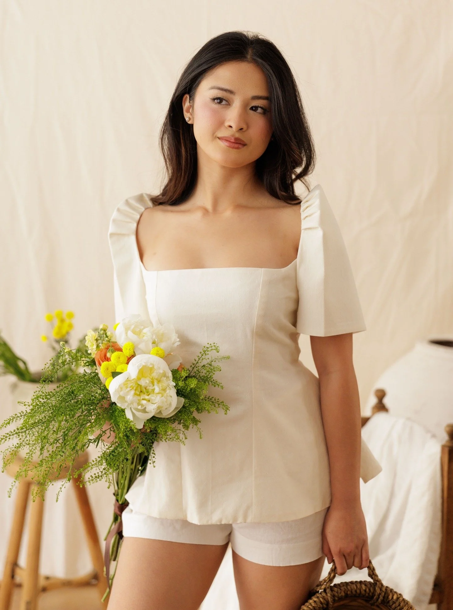 Introducing Summer 26. A petite collection of summer ready looks in breathable 100% cotton. 

These new styles drop Friday, May 29th at 5am PST on my website, www.shoplaunion.com. 

Featured in this photo is the Consuela Top in Warm White Cotton.

Mo