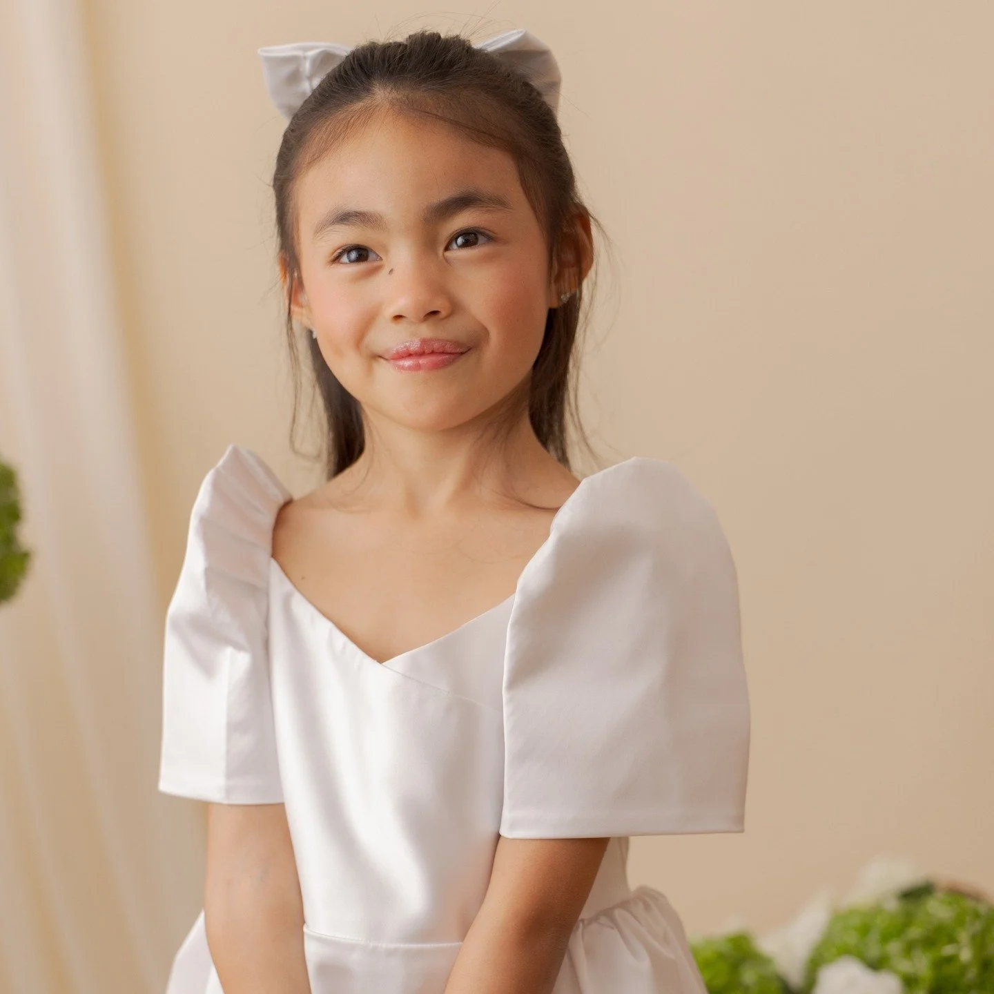 Little Lamb '26 is a collection designed to celebrate those most meaningful moments in your daughter's life that mark a milestone in her faith journey. The name "little lamb" comes from the book of Mark, where Jesus brings the daughter of J
