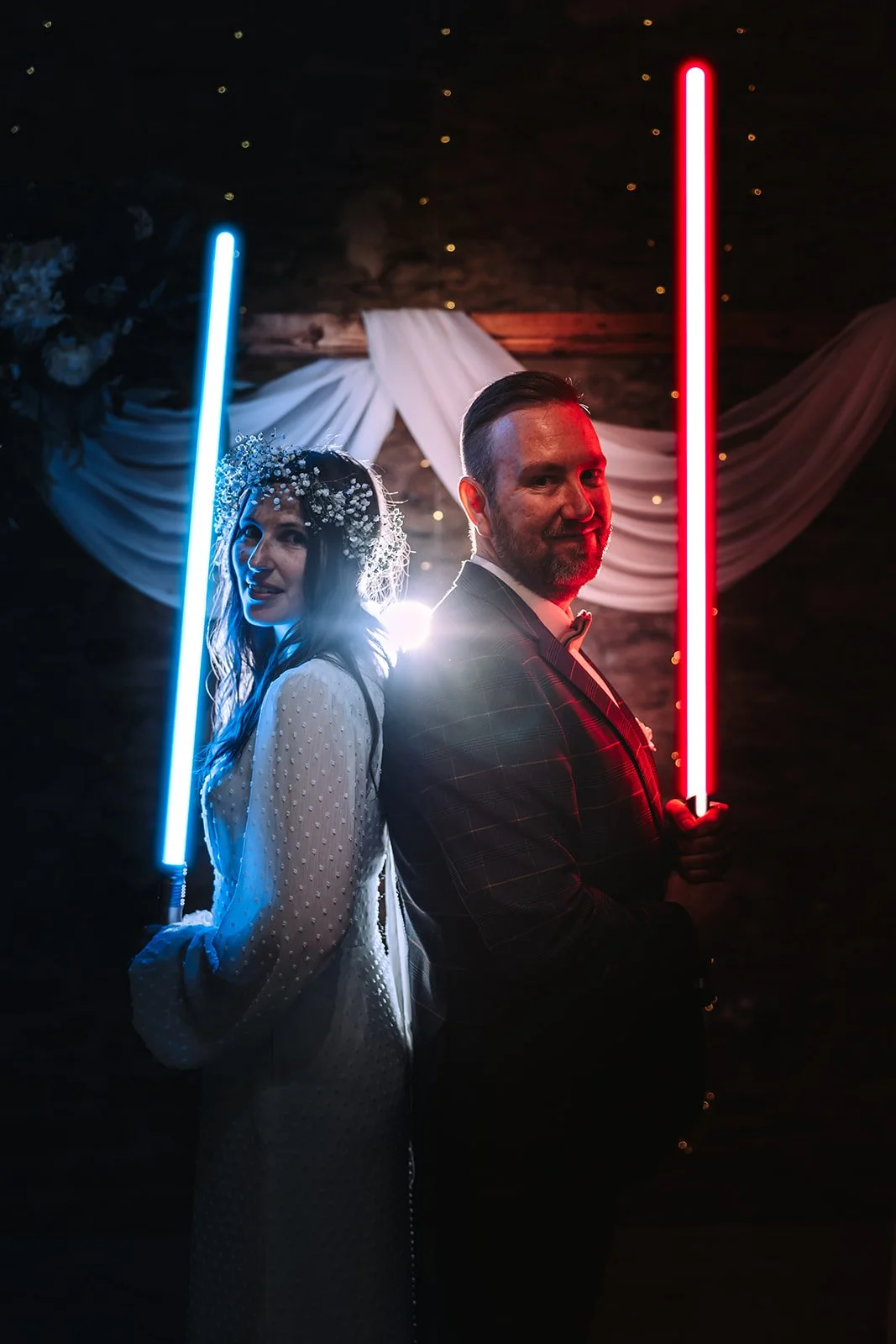 Bride & Groom having Star Wars themed wedding photo.