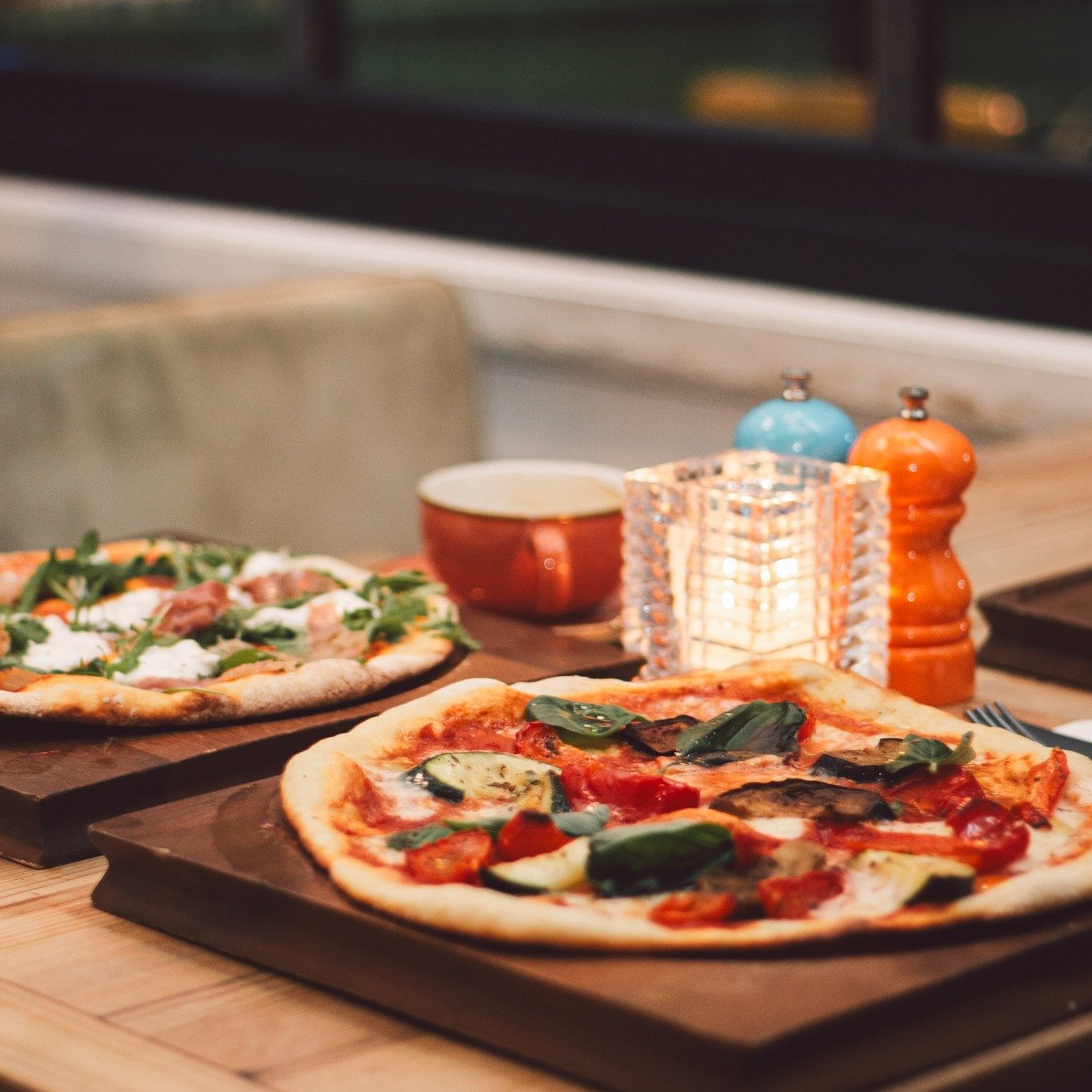 Gather 'round, pizza lovers! 🎉 There's nothing quite like enjoying a hot, cheesy slice with your favourite crew, am I right?

We believe in crafting moments that are as delicious as they are memorable. That's why all our pizzas are made from scratch