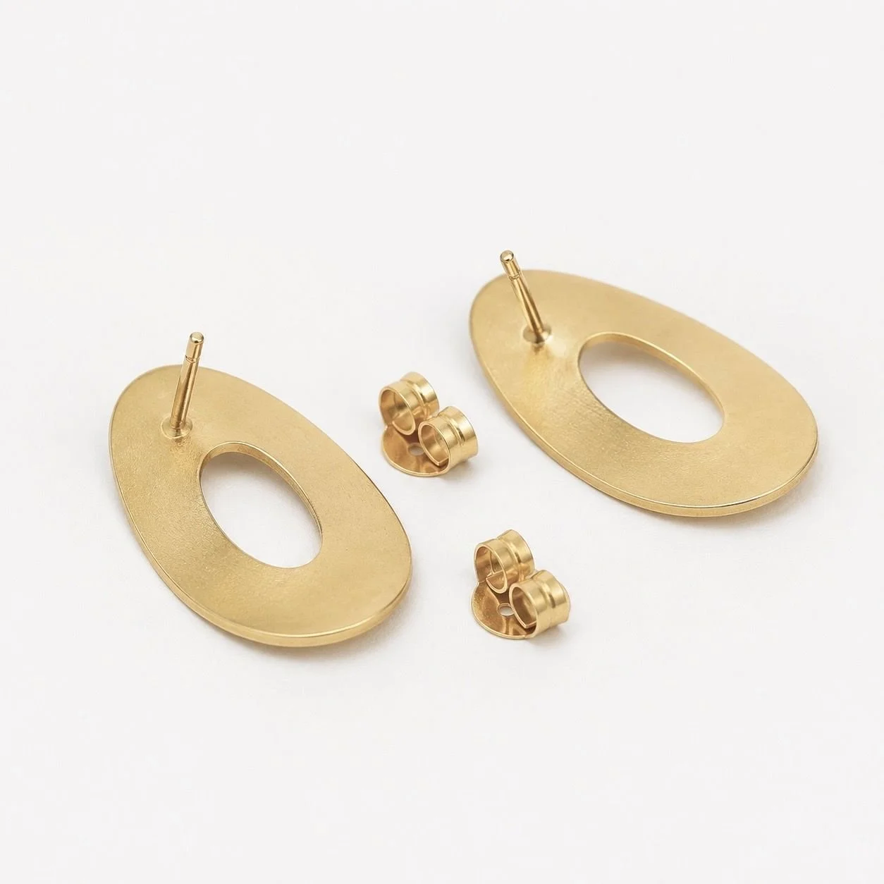 Floating Ovals Bloom stud earrings in gold vermeil, shown at a three-quarter angle with posts and butterfly backs
